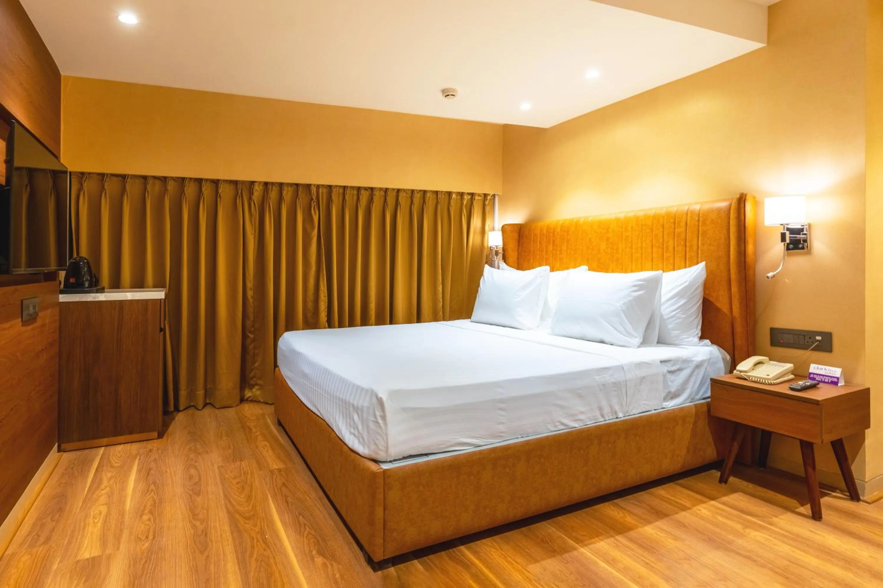 Bed in Clarks Inn Suites Hyderabad Airport