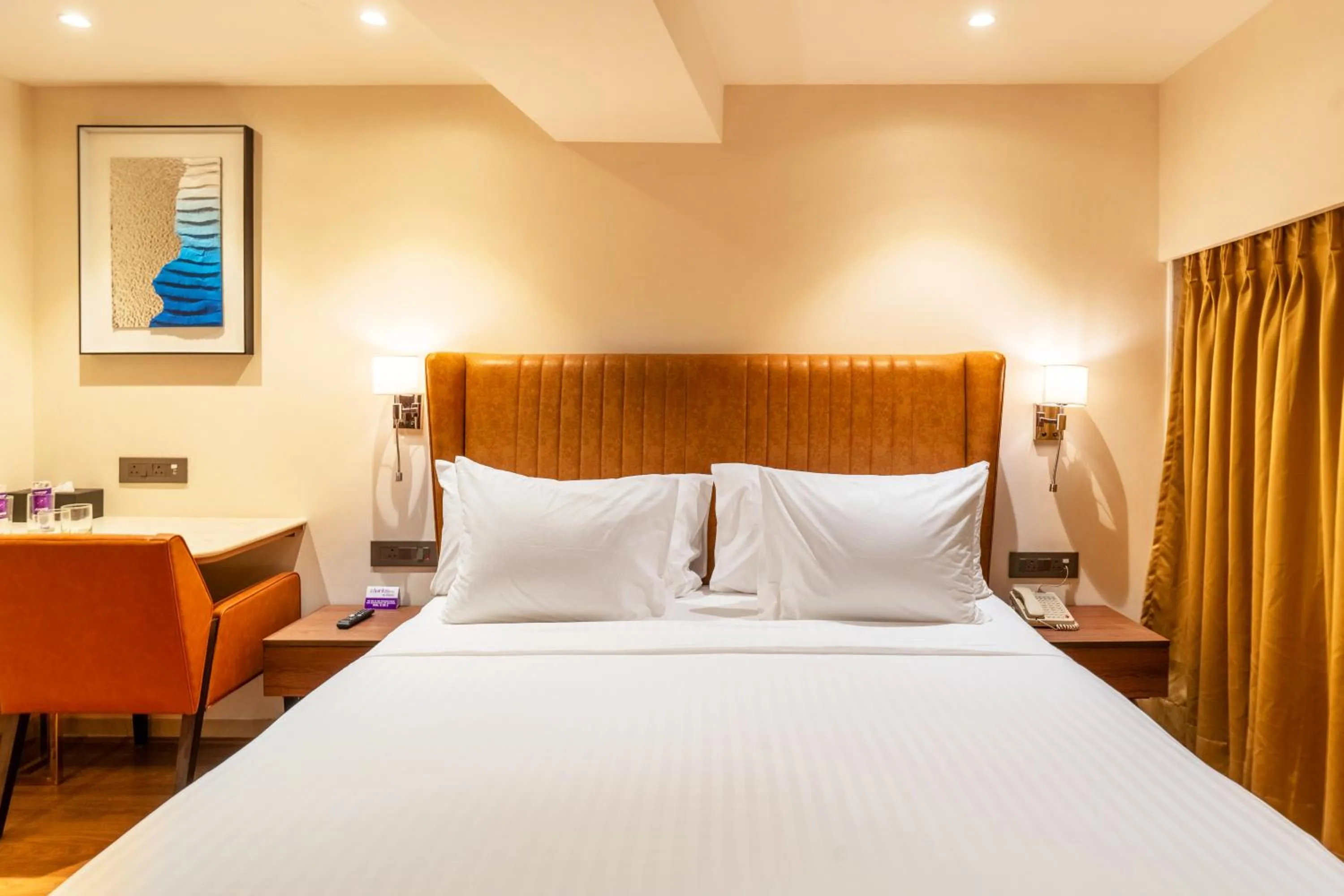 Bed in Clarks Inn Suites Hyderabad Airport