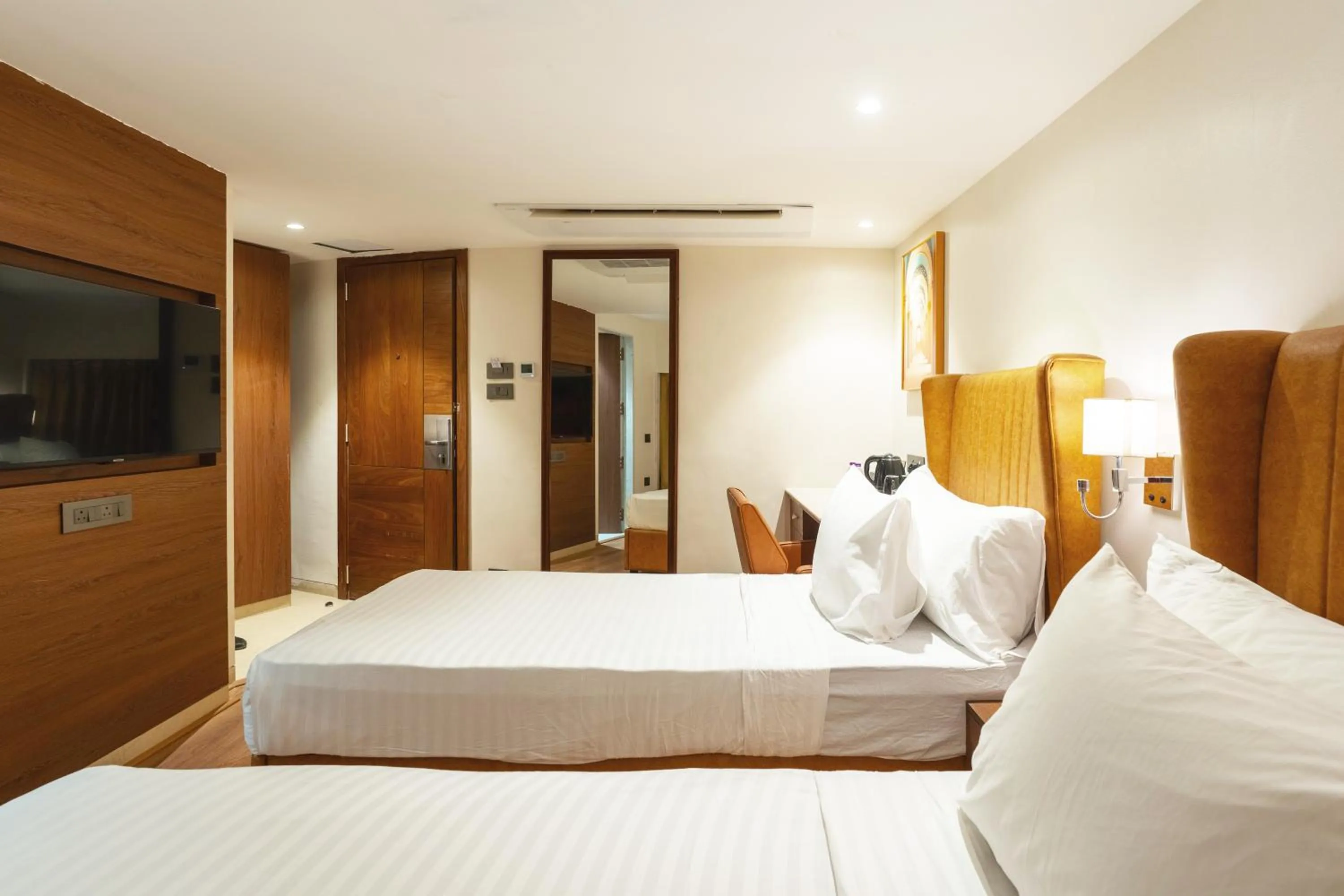 Bedroom, Bed in Clarks Inn Suites Hyderabad Airport