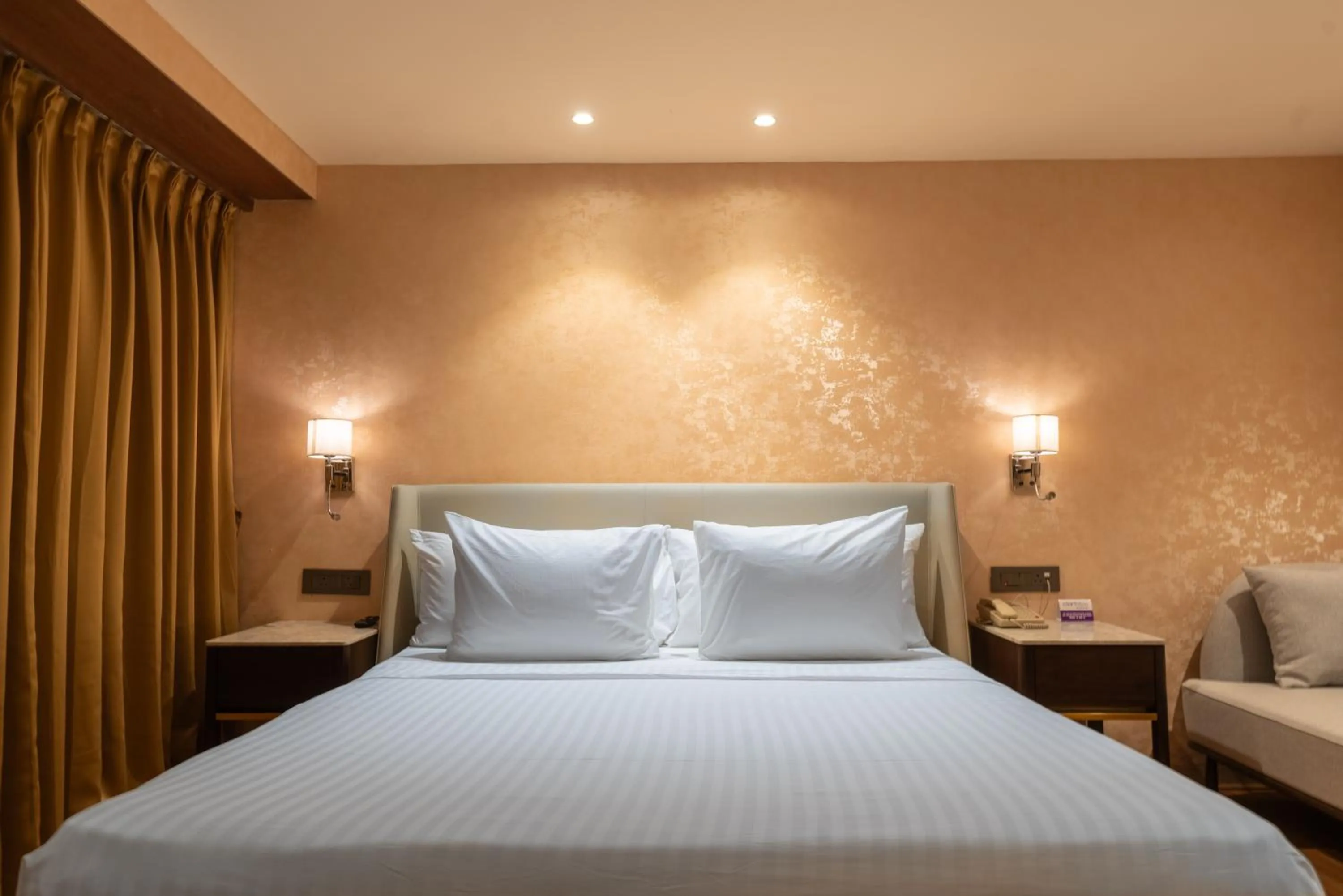 Bed in Clarks Inn Suites Hyderabad Airport