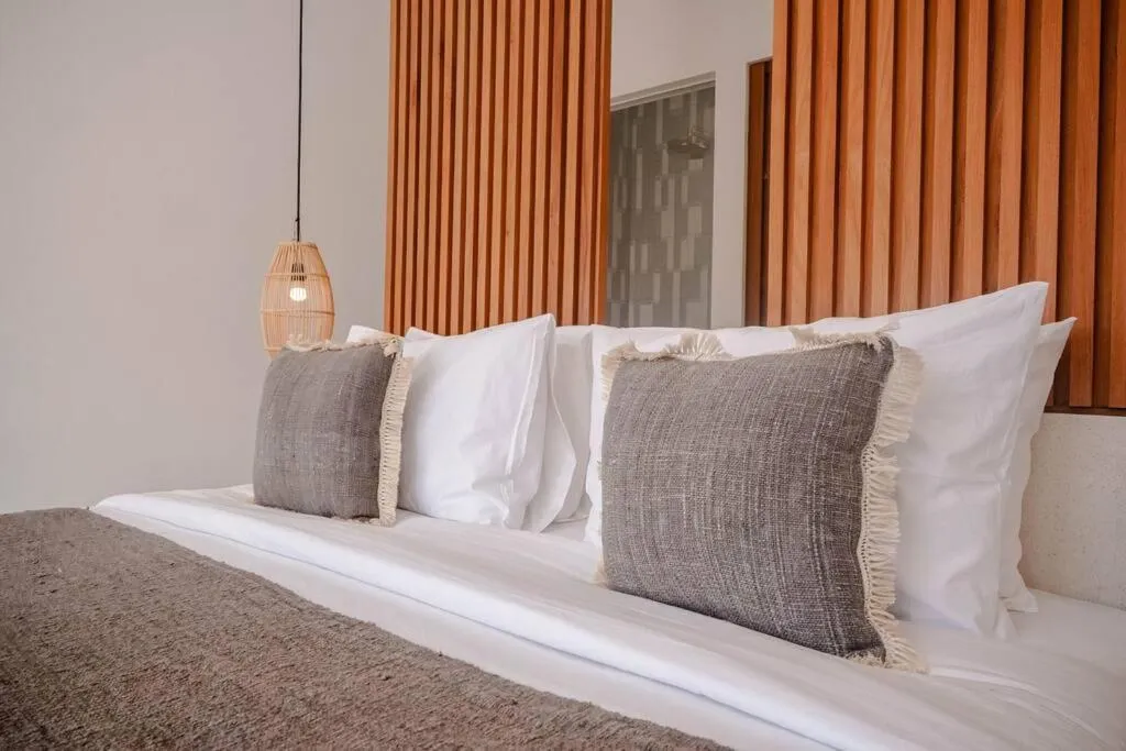 Bed in Las Casas Canggu Minimalist Studio with Pool