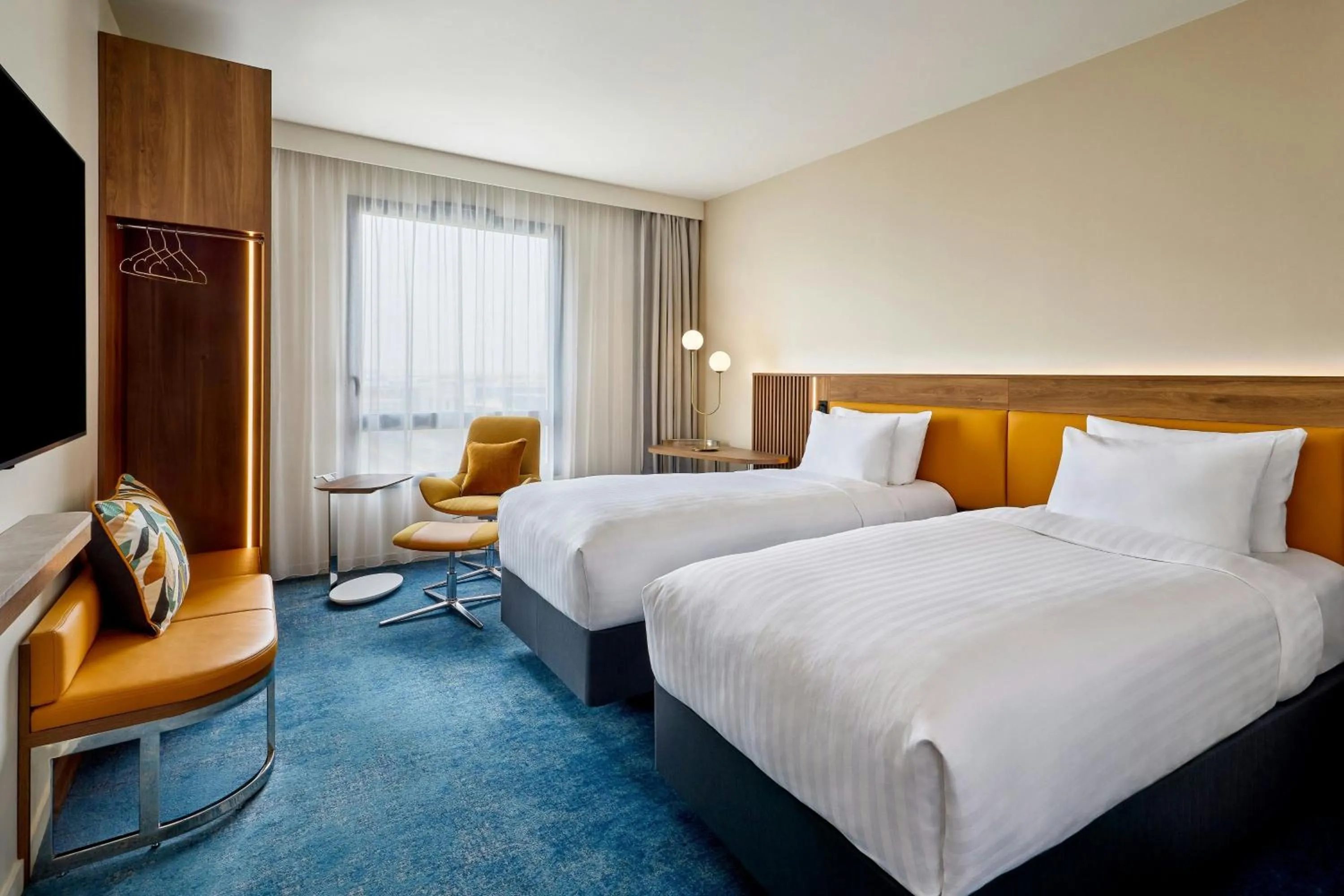 Photo of the whole room, Bed in Courtyard by Marriott Lyon Eurexpo Stadium