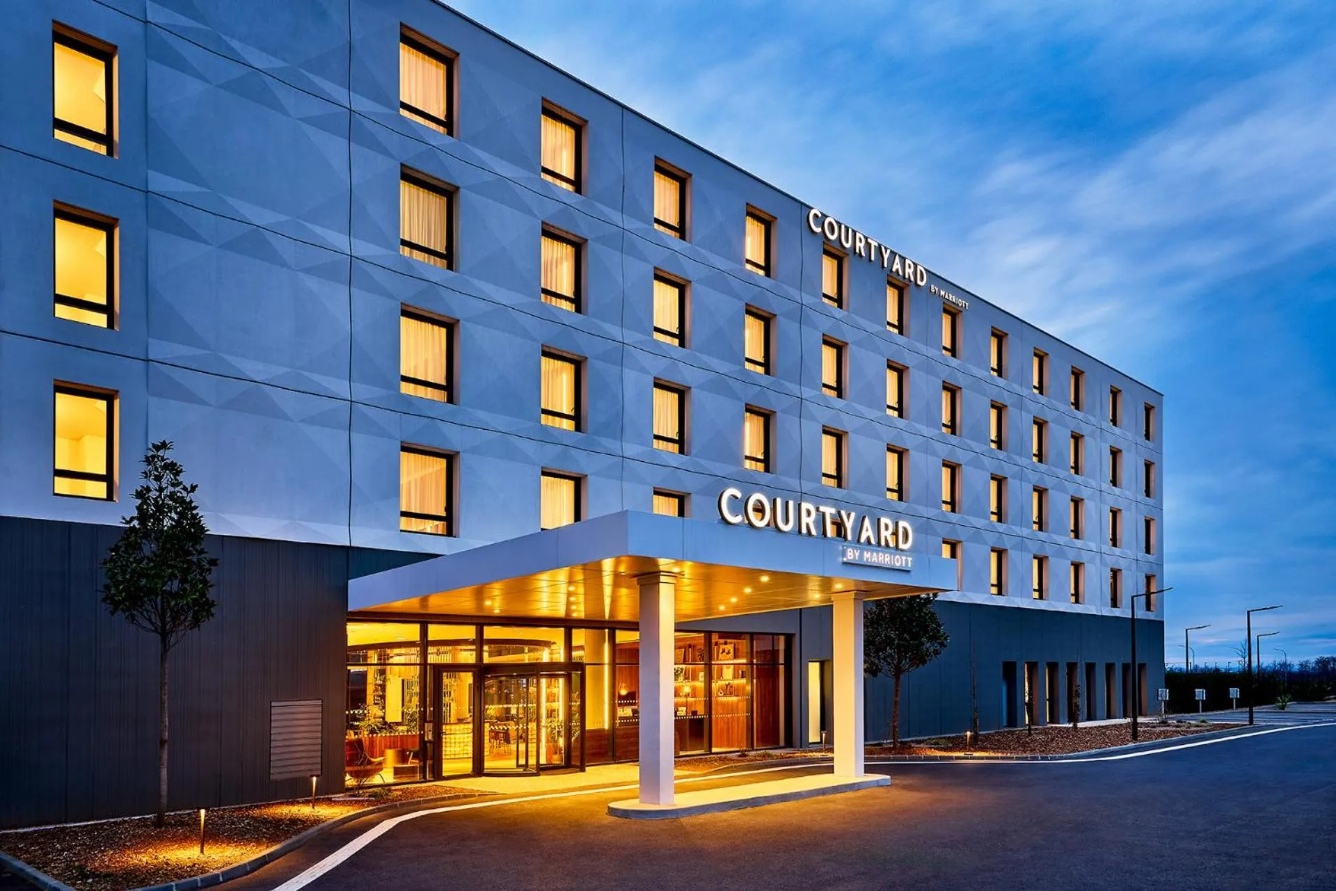 Property building in Courtyard by Marriott Lyon Eurexpo Stadium