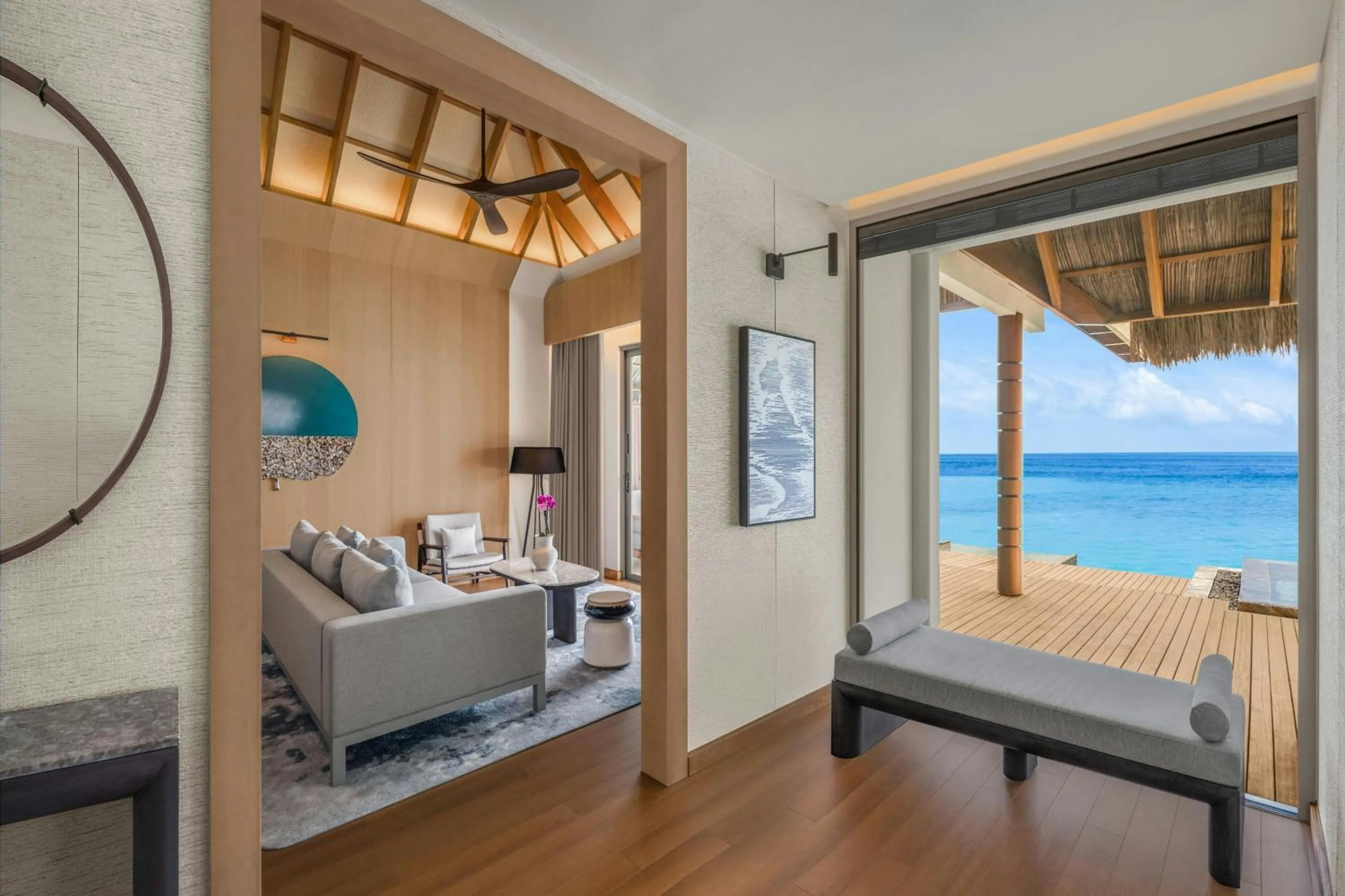 Living room, Bed in JW Marriott Maldives Kaafu Atoll Island Resort