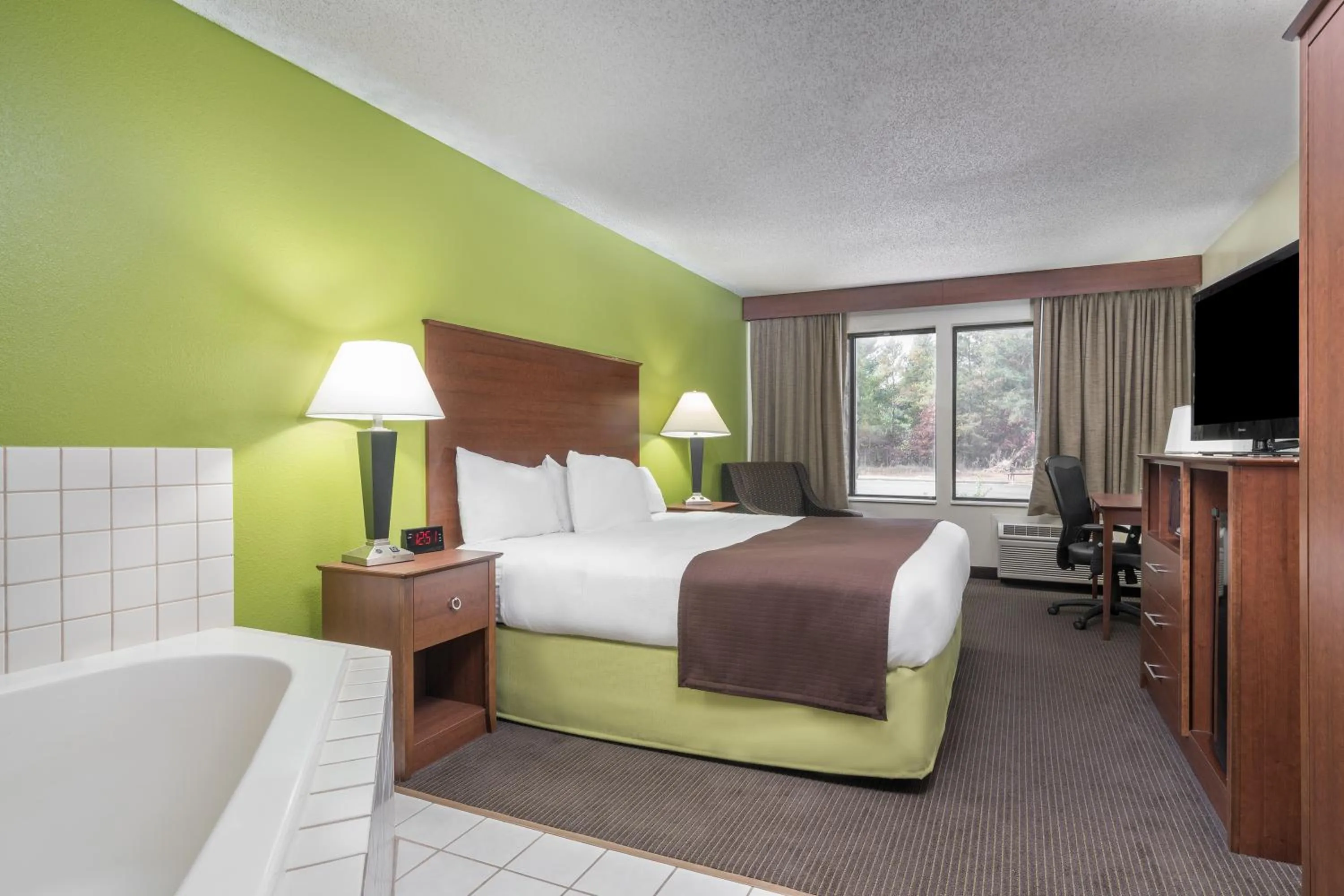 Photo of the whole room, Bed in AmericInn by Wyndham Black River Falls I-94 on ATV Trail