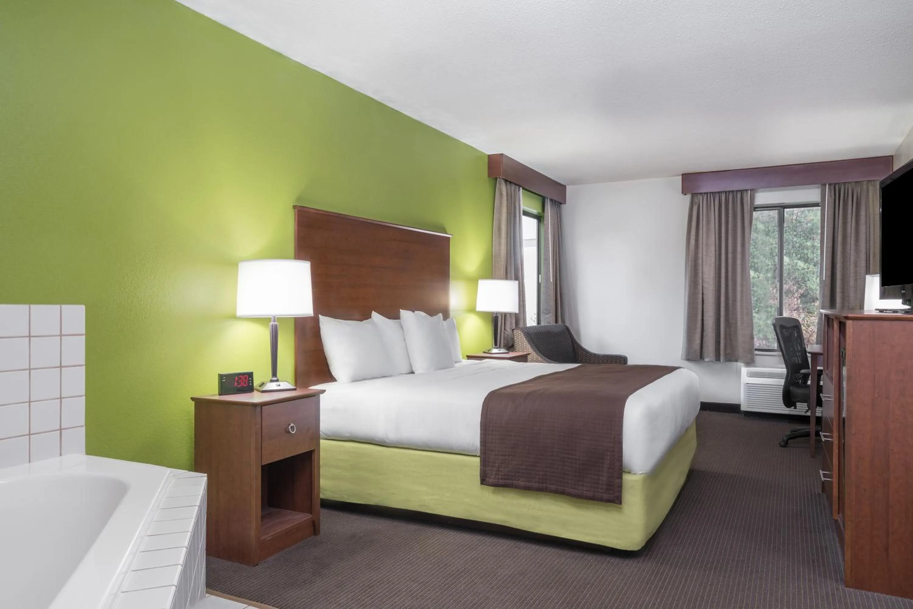 Photo of the whole room, Bed in AmericInn by Wyndham Black River Falls I-94 on ATV Trail