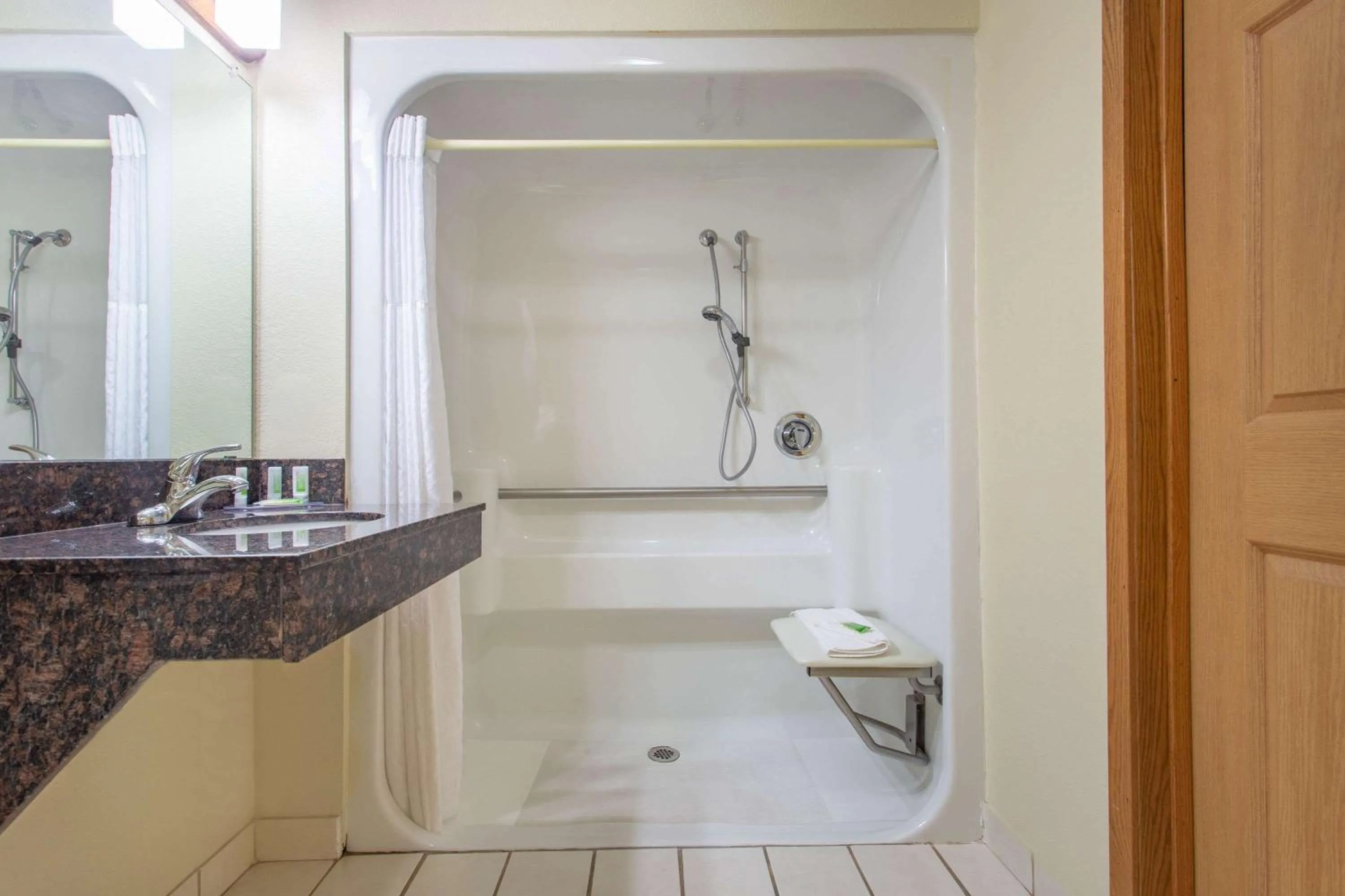 Shower in AmericInn by Wyndham Black River Falls I-94 on ATV Trail