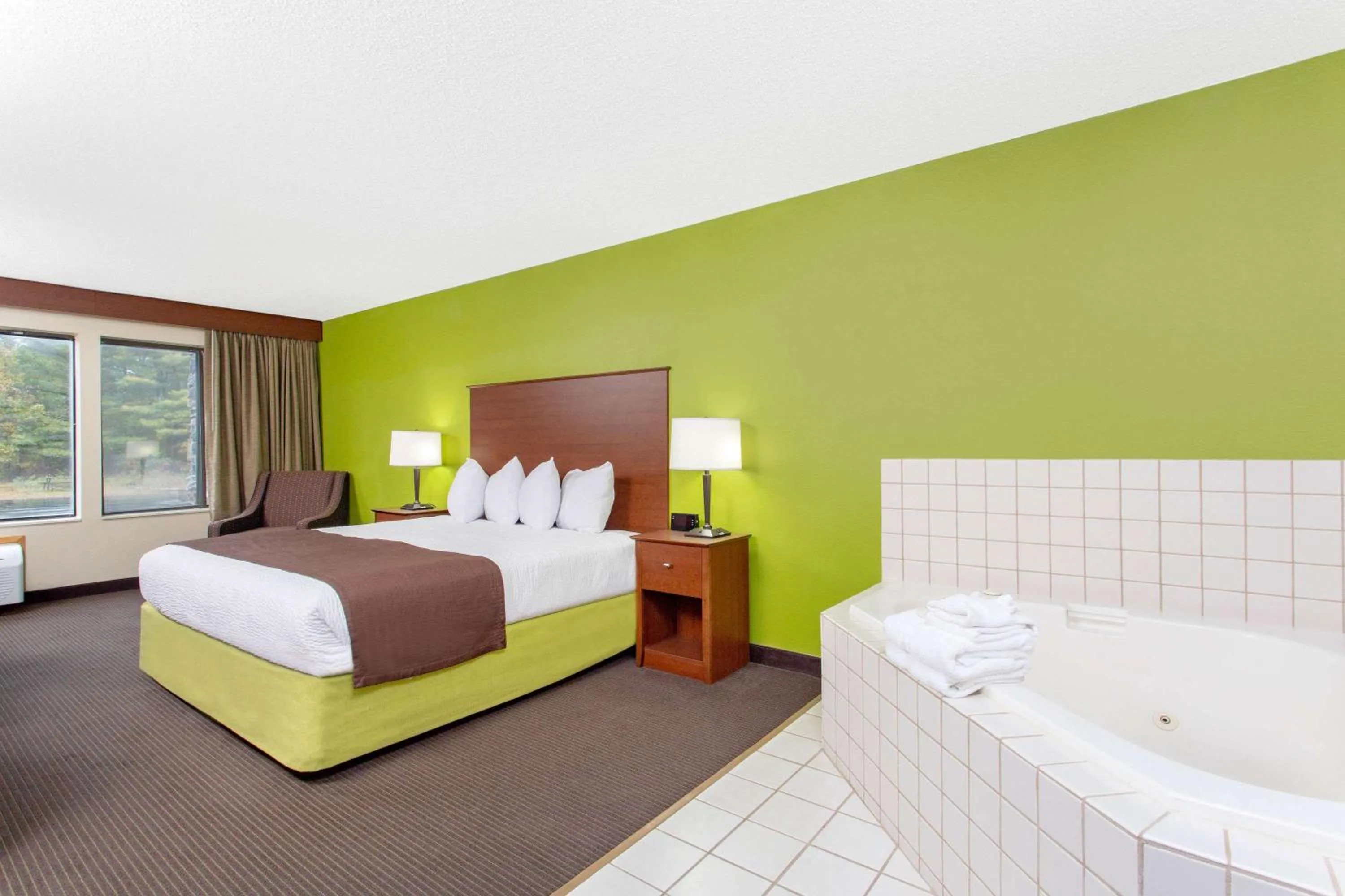 Photo of the whole room, Bed in AmericInn by Wyndham Black River Falls I-94 on ATV Trail