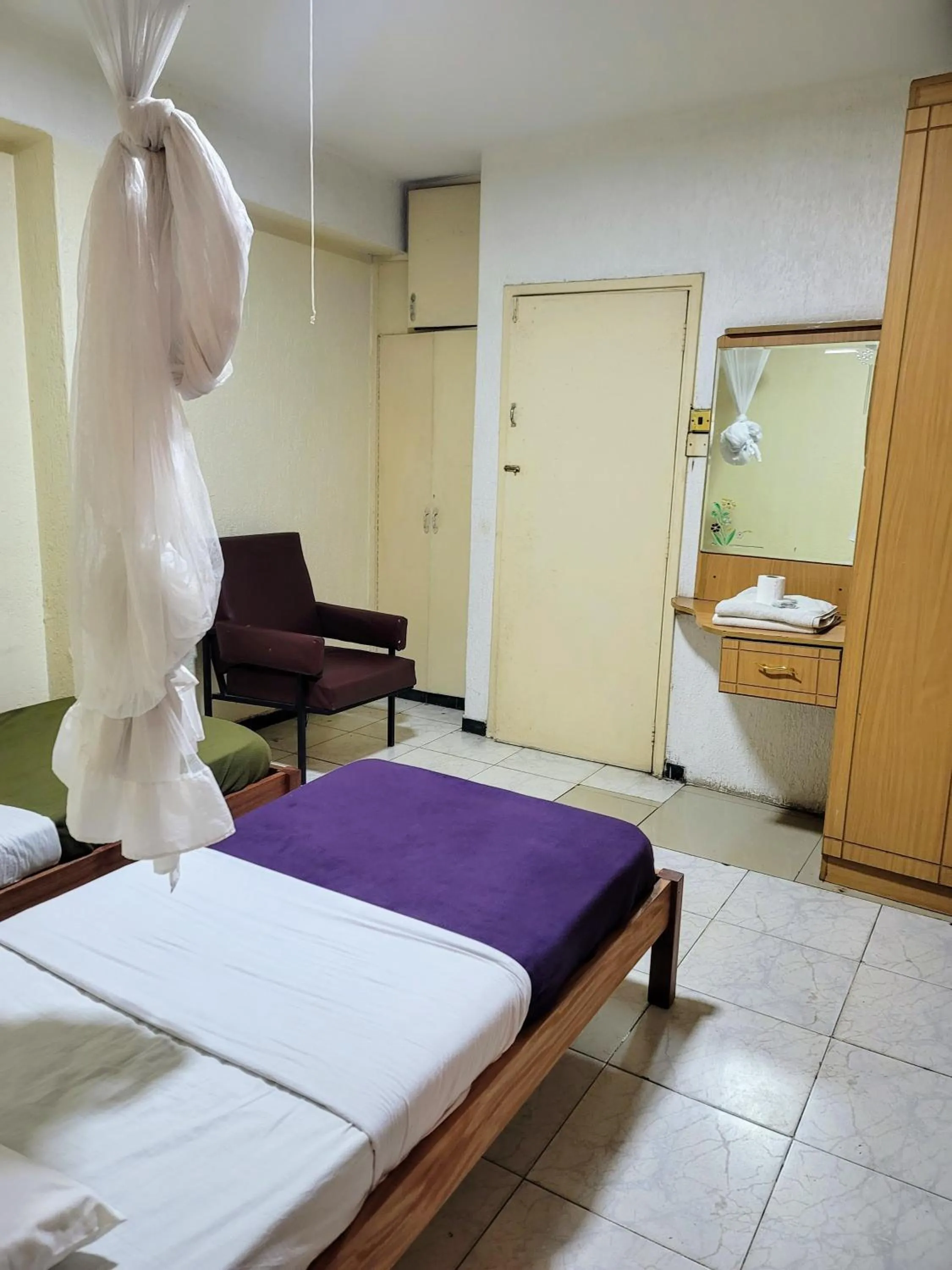 Toilet, Bed in Nairobi Glory Palace Hotel