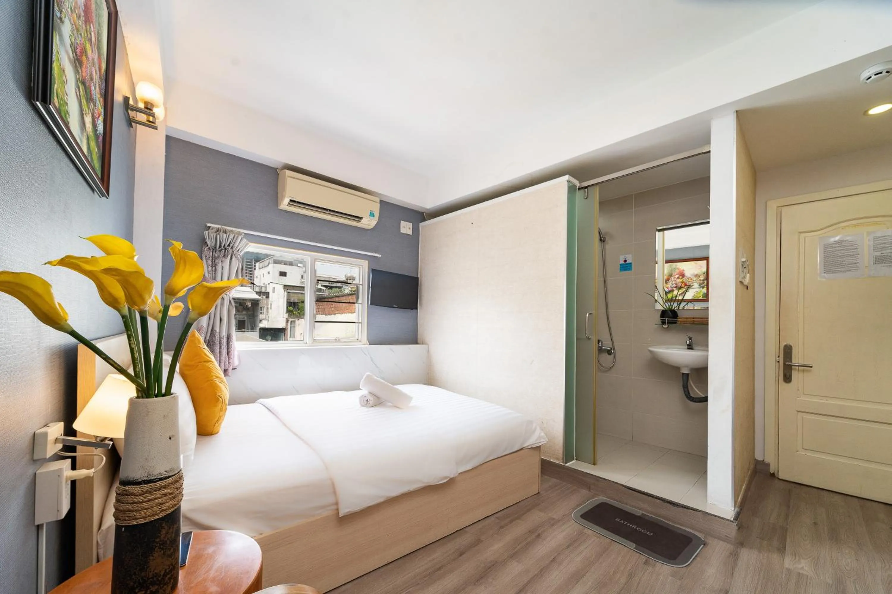 Bed in Galaxy Boutique Sai Gon Central Hotel