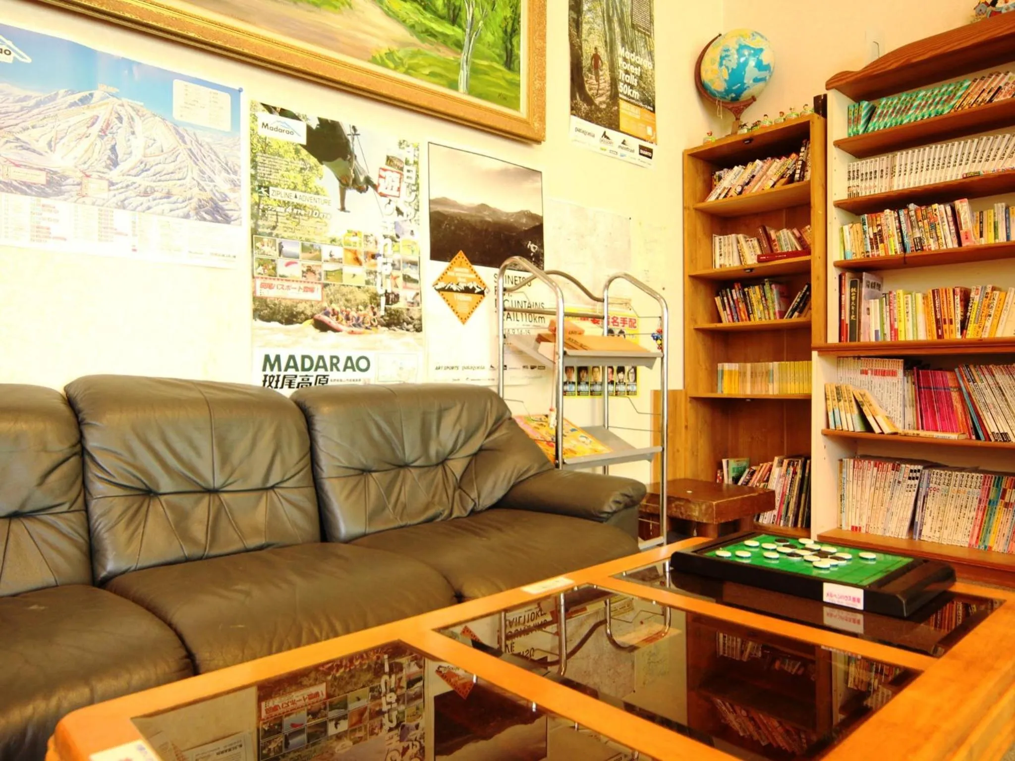 Communal lounge/ TV room in Marchen House Madarao