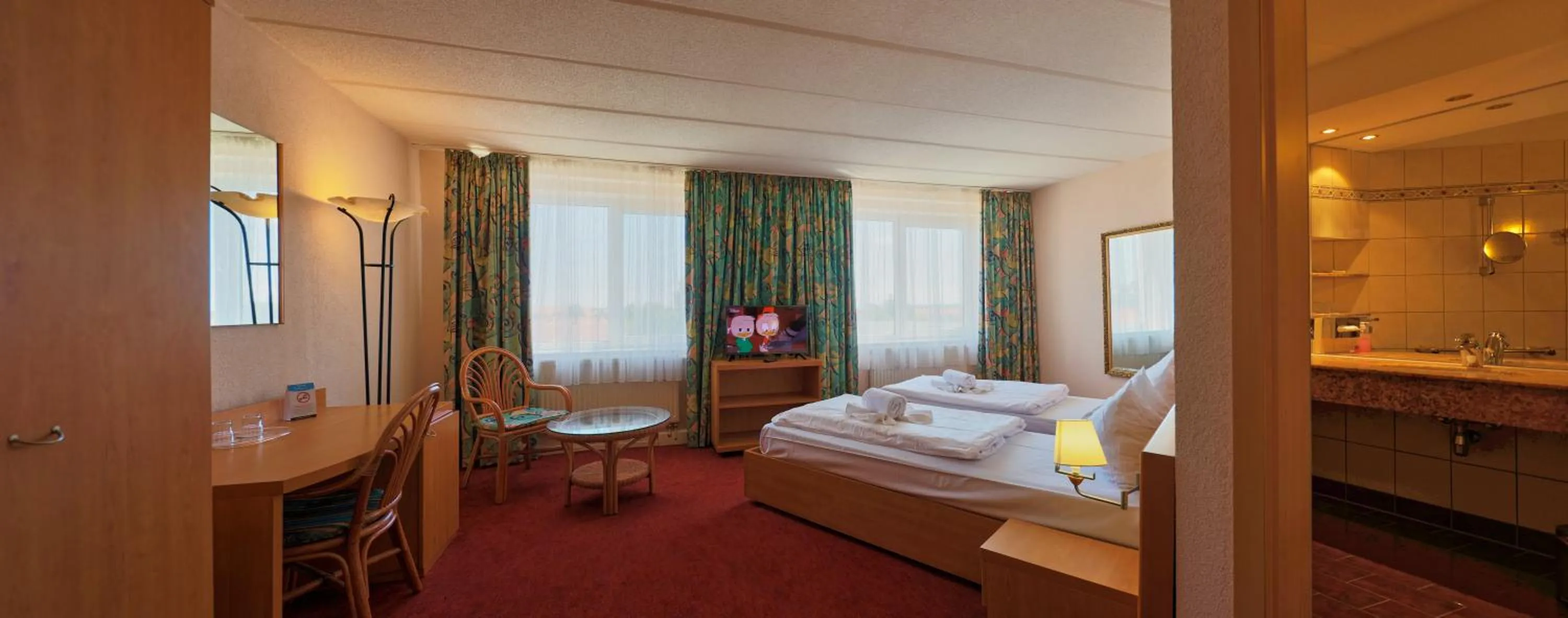 Bed in TRIP INN Axxon Hotel