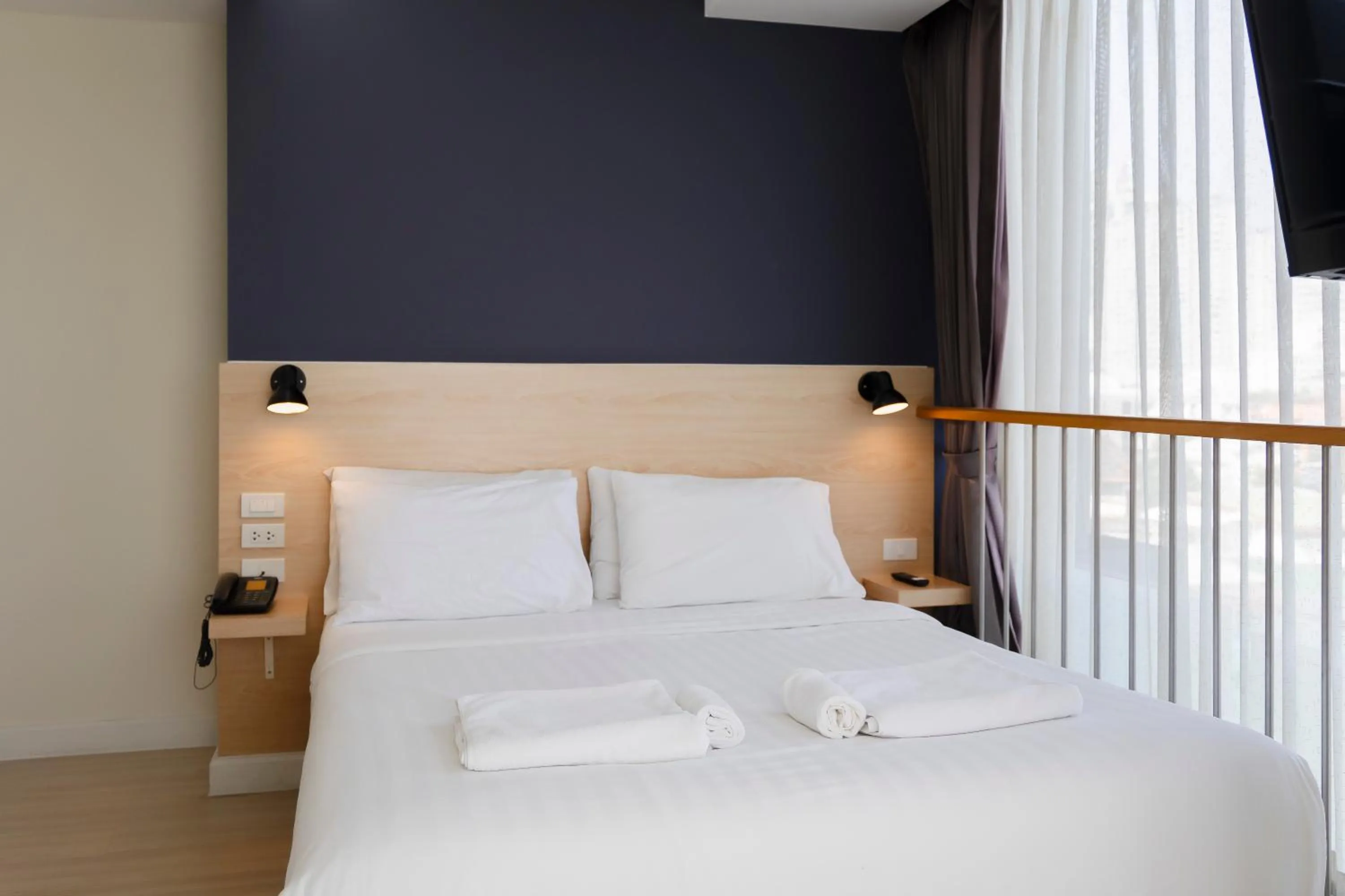 towels, Bed in GP House Express Sukhumvit 81