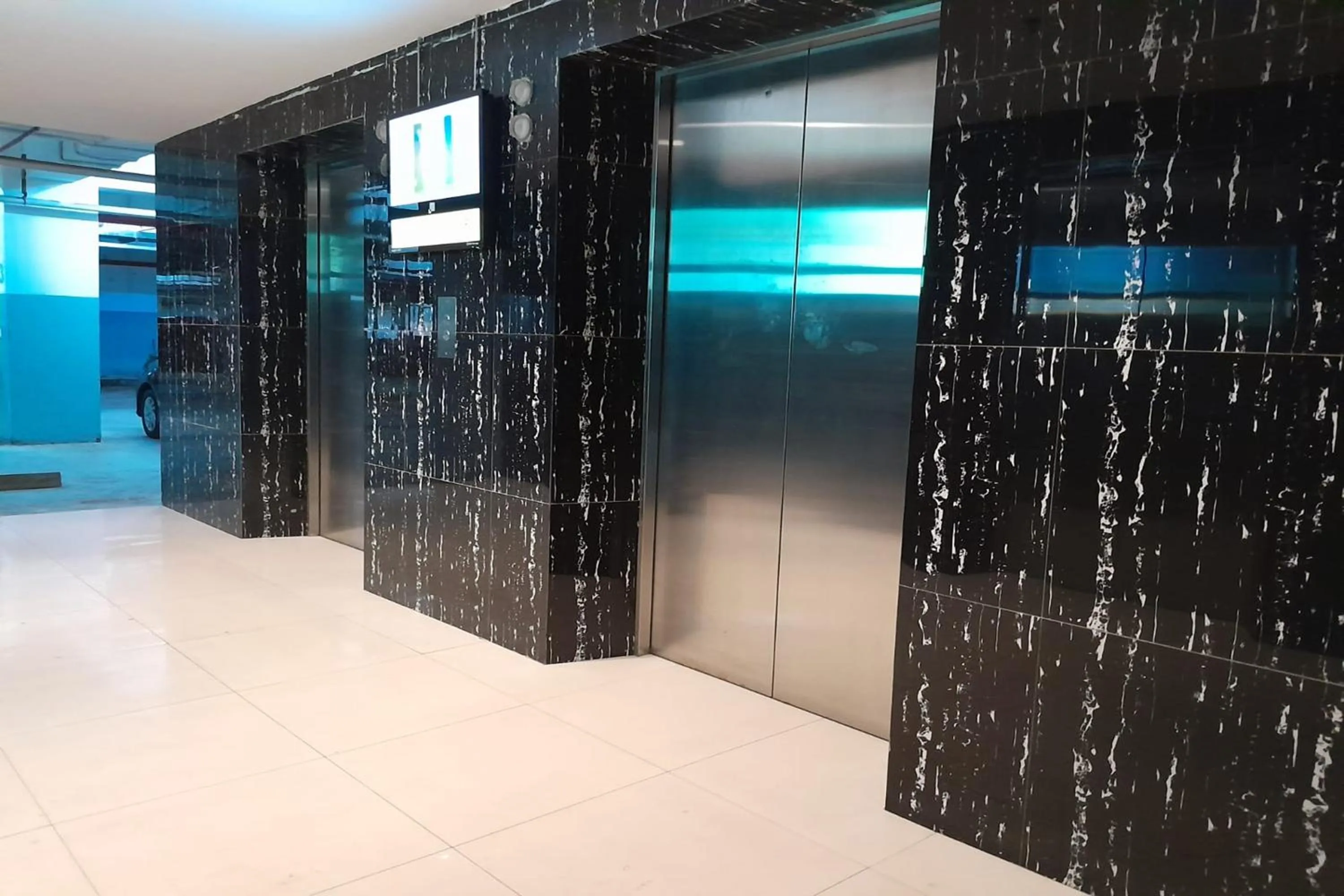 elevator in Majestic Point Serpong by Nature
