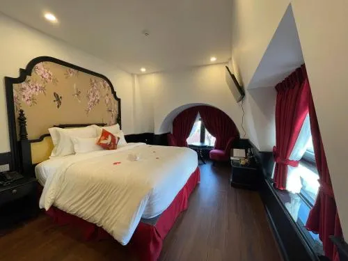Bed in The ORCHID PREMIUM Hotel