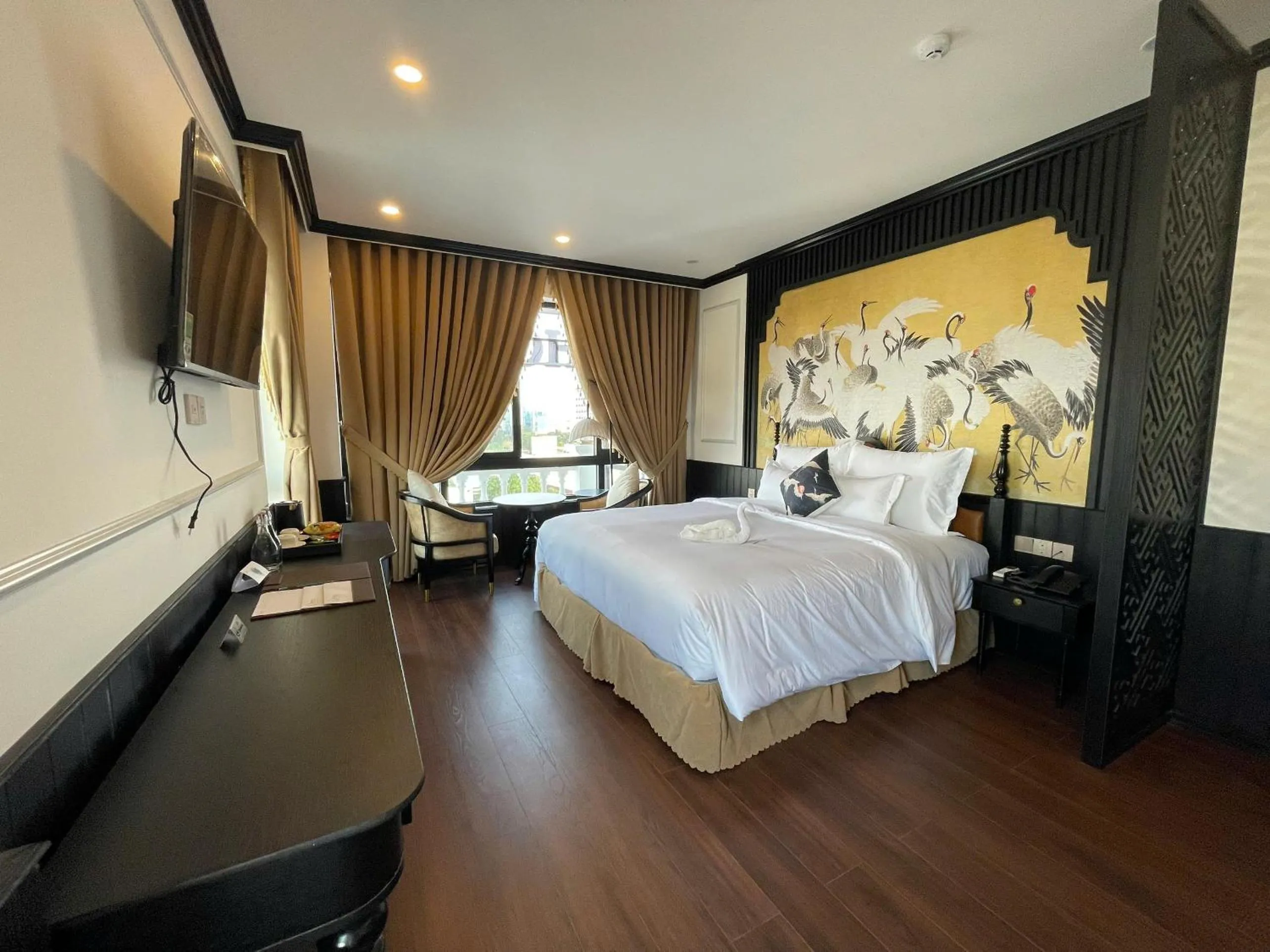 Bed in The ORCHID PREMIUM Hotel