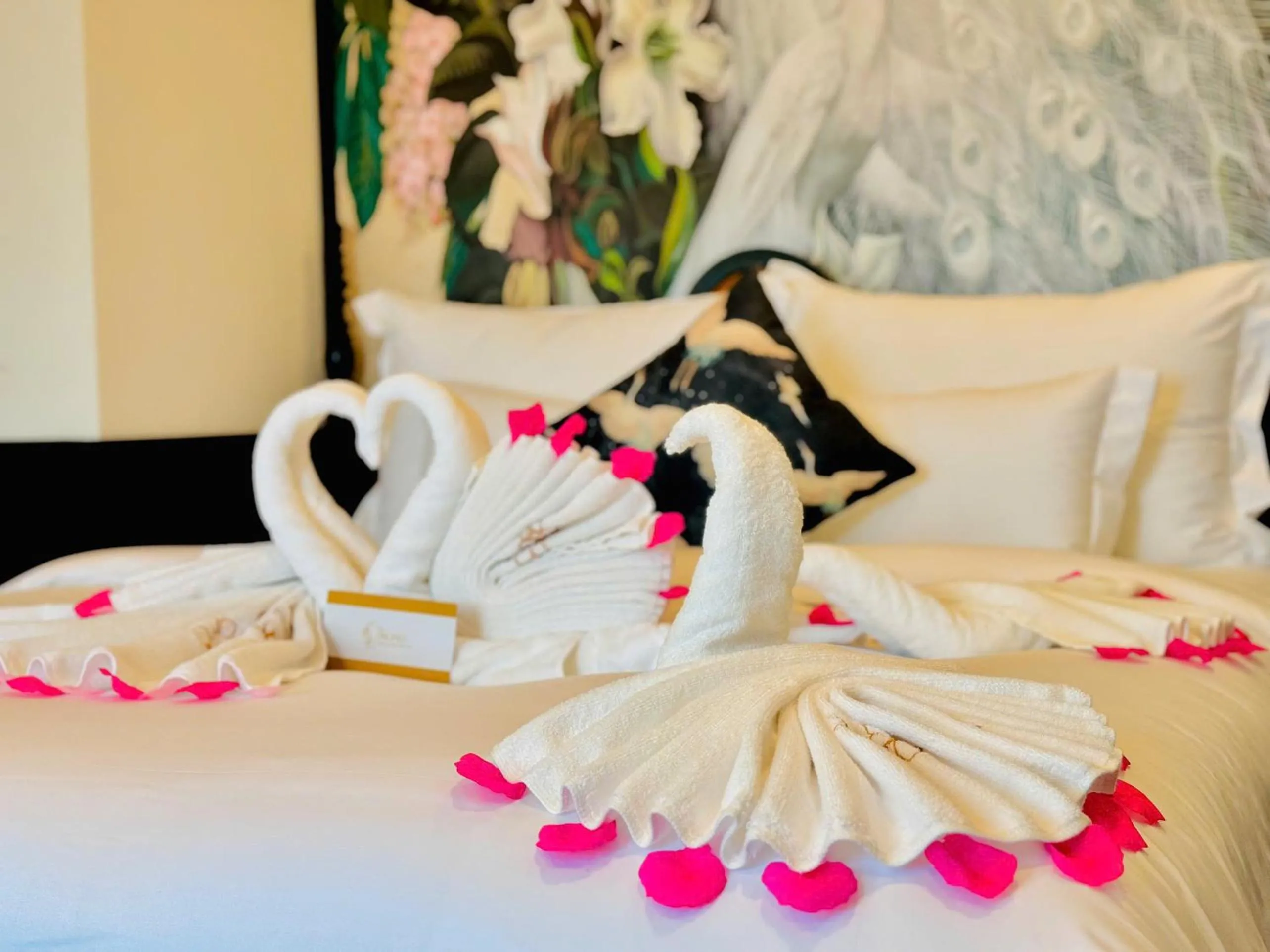 Bed in The ORCHID PREMIUM Hotel