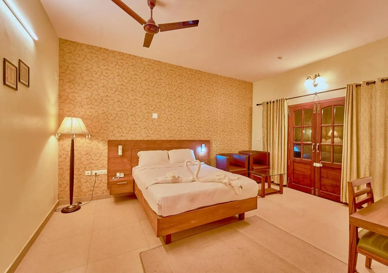 Photo of the whole room, Bed in Ushasree Wayanad Premium Pool Resort by VOYE HOMES