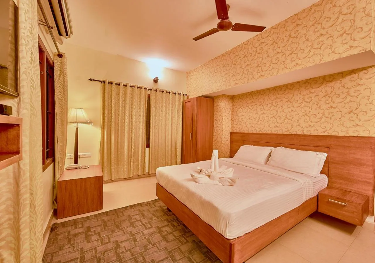 Bed in Ushasree Wayanad Premium Pool Resort by VOYE HOMES
