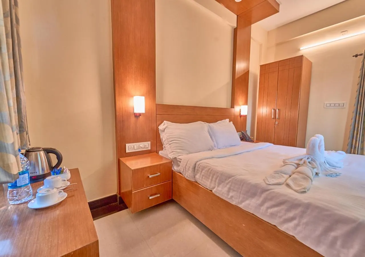 Bed in Ushasree Wayanad Premium Pool Resort by VOYE HOMES