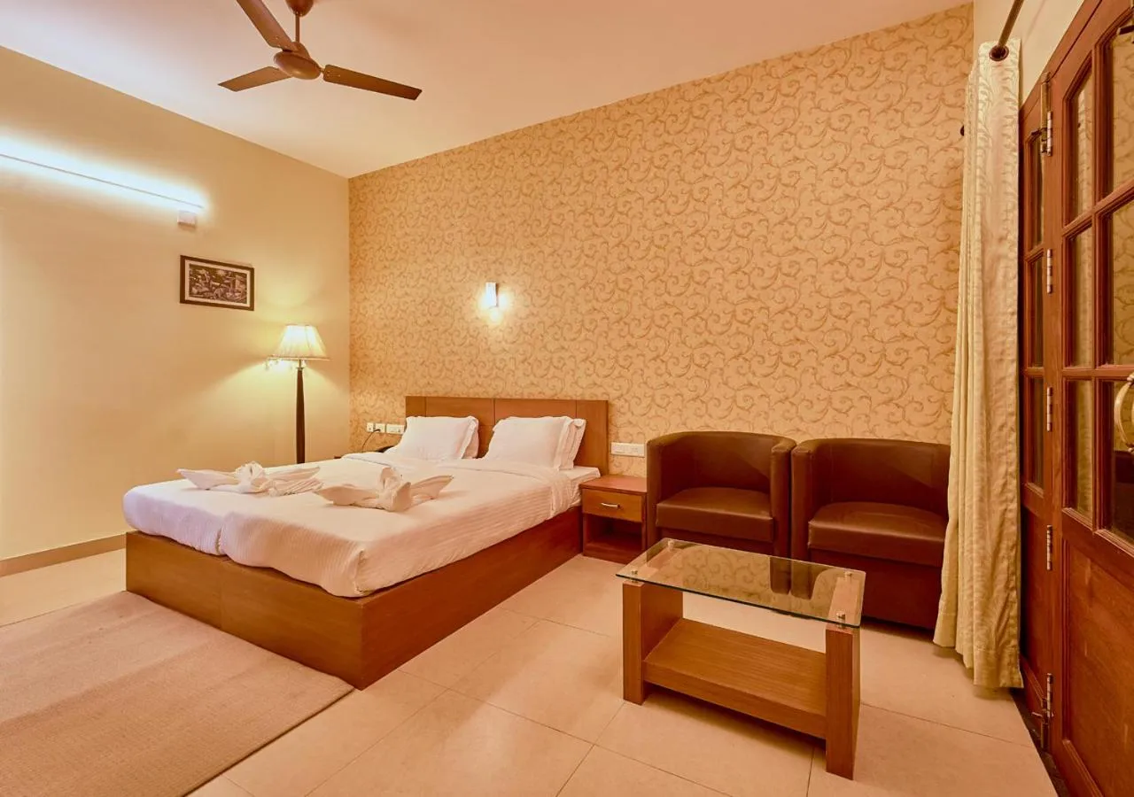 Bed in Ushasree Wayanad Premium Pool Resort by VOYE HOMES