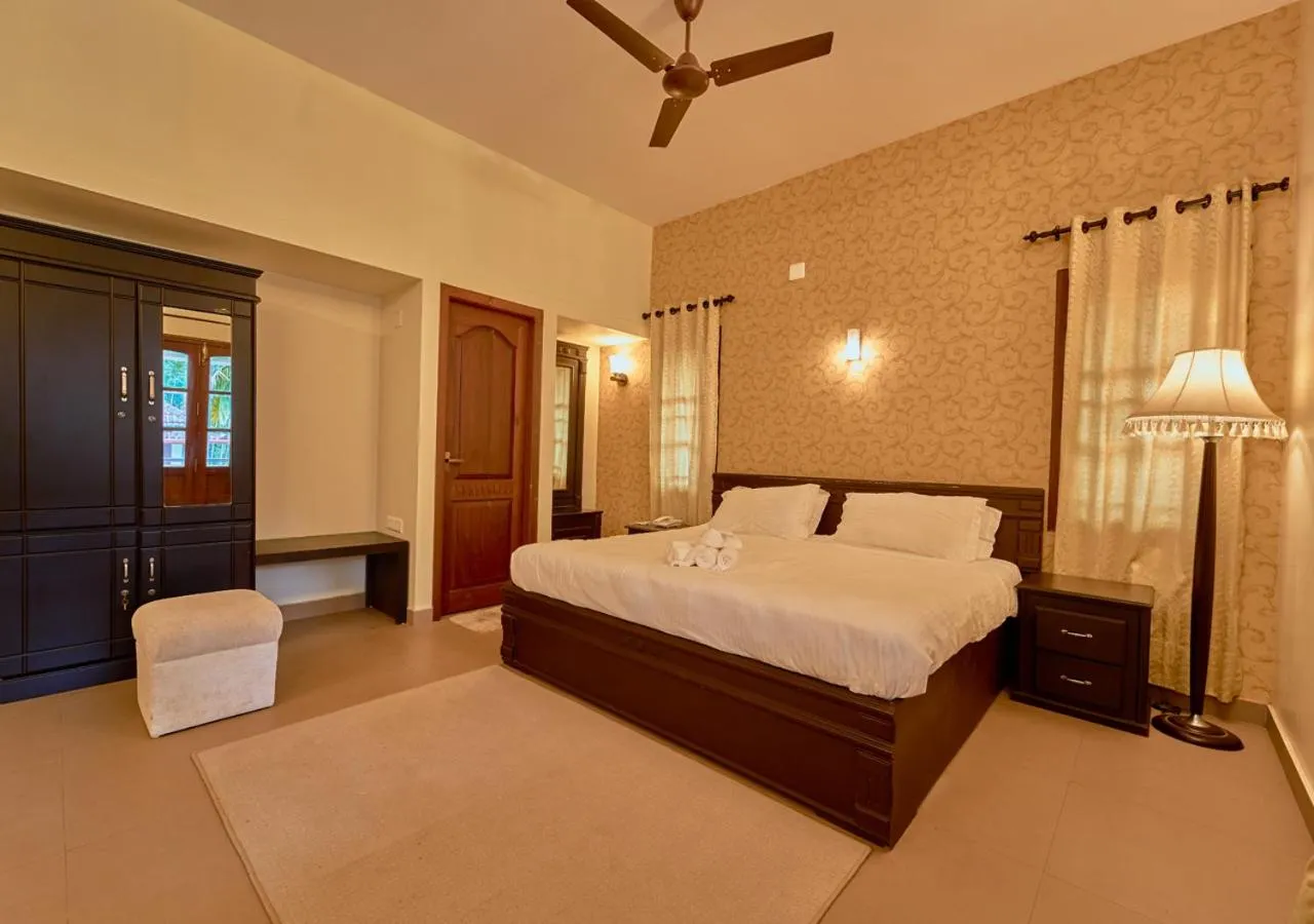 Photo of the whole room, Bed in Ushasree Wayanad Premium Pool Resort by VOYE HOMES