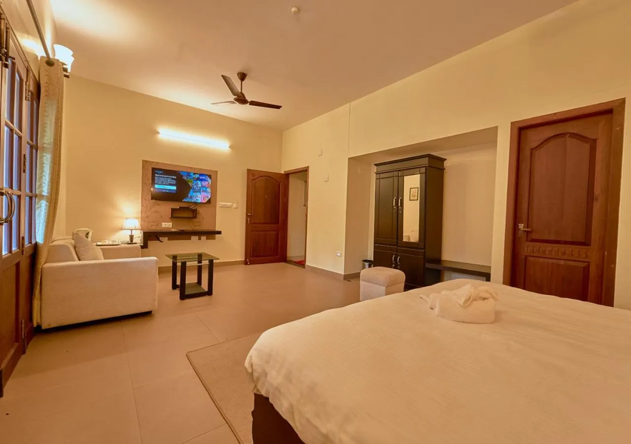 Bed in Ushasree Wayanad Premium Pool Resort by VOYE HOMES