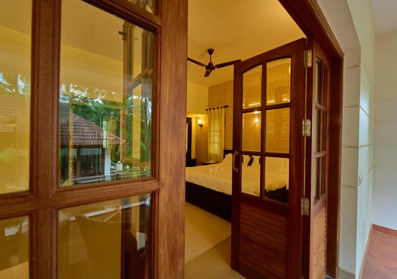 Balcony/Terrace, Bed in Ushasree Wayanad Premium Pool Resort by VOYE HOMES