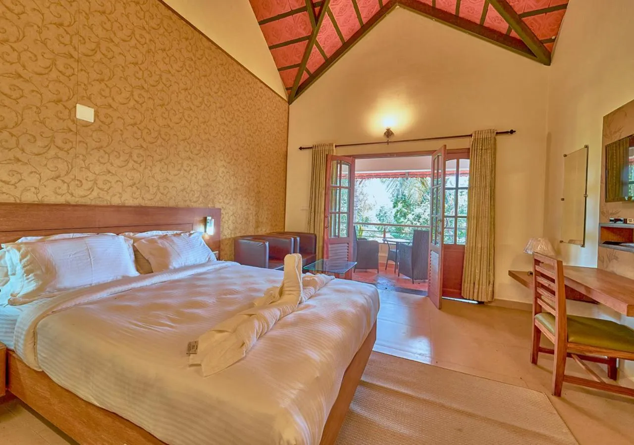 Bed in Ushasree Wayanad Premium Pool Resort by VOYE HOMES