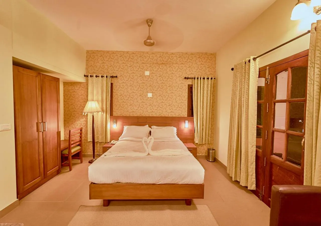 Photo of the whole room, Bed in Ushasree Wayanad Premium Pool Resort by VOYE HOMES