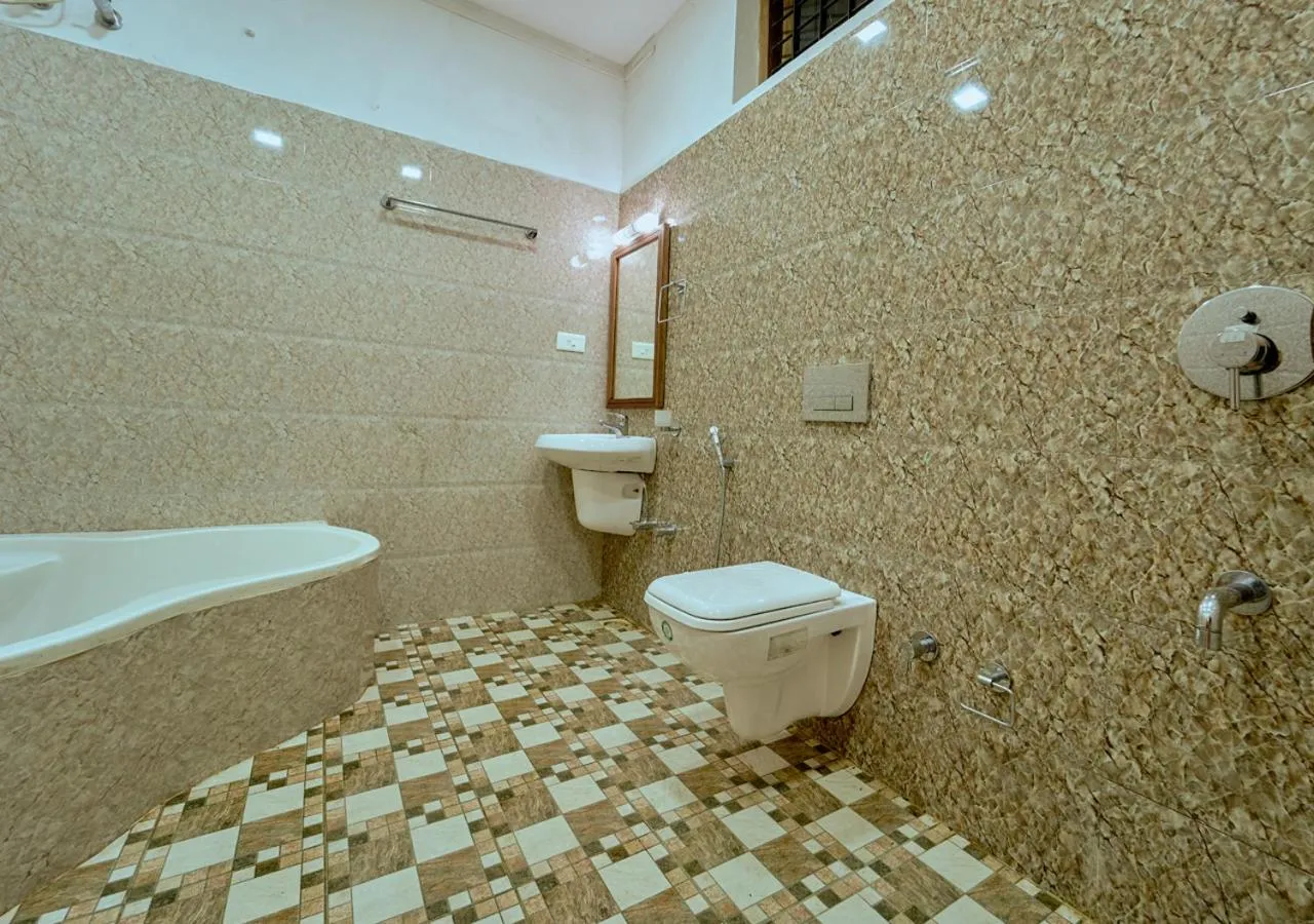 Toilet in Ushasree Wayanad Premium Pool Resort by VOYE HOMES