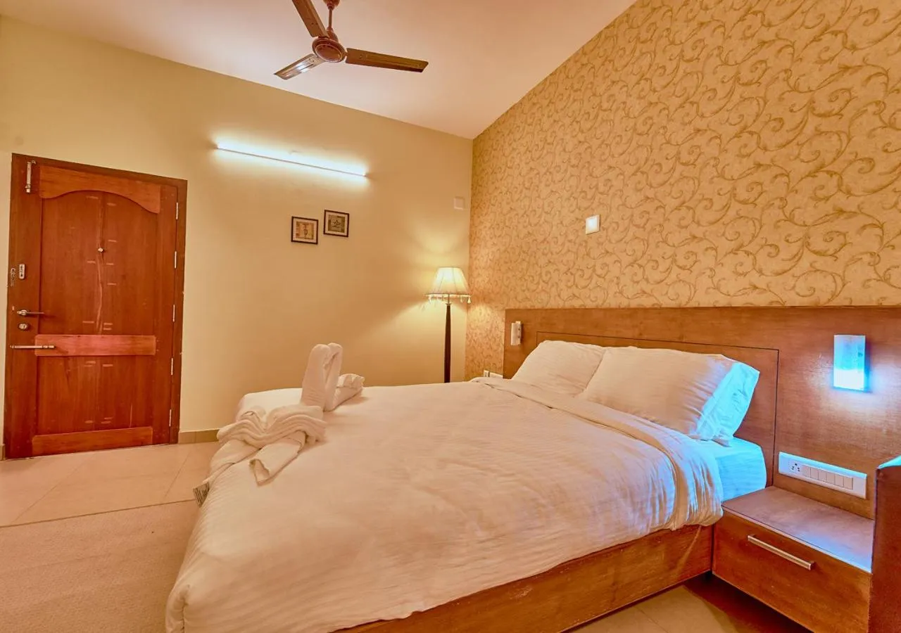 Photo of the whole room, Bed in Ushasree Wayanad Premium Pool Resort by VOYE HOMES