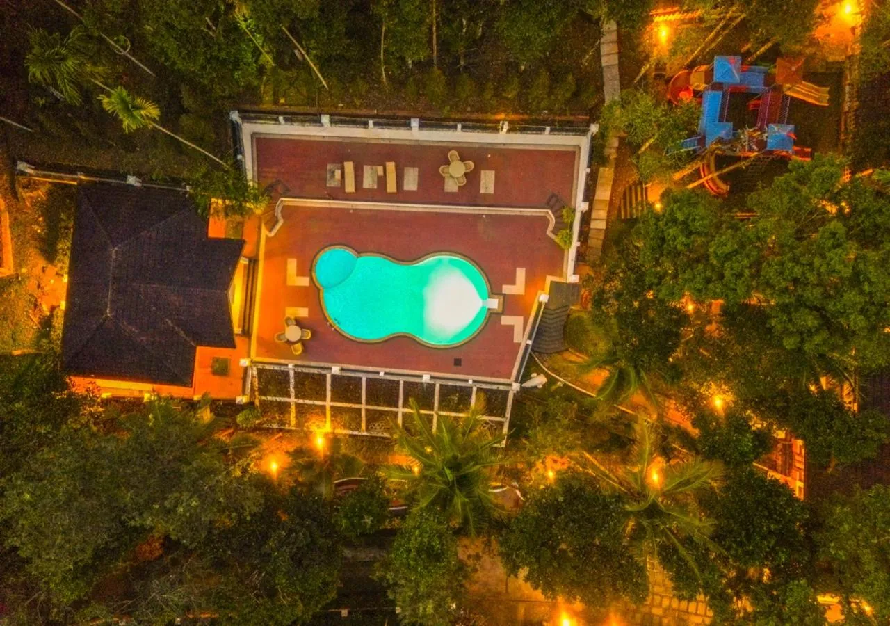 Night in Ushasree Wayanad Premium Pool Resort by VOYE HOMES