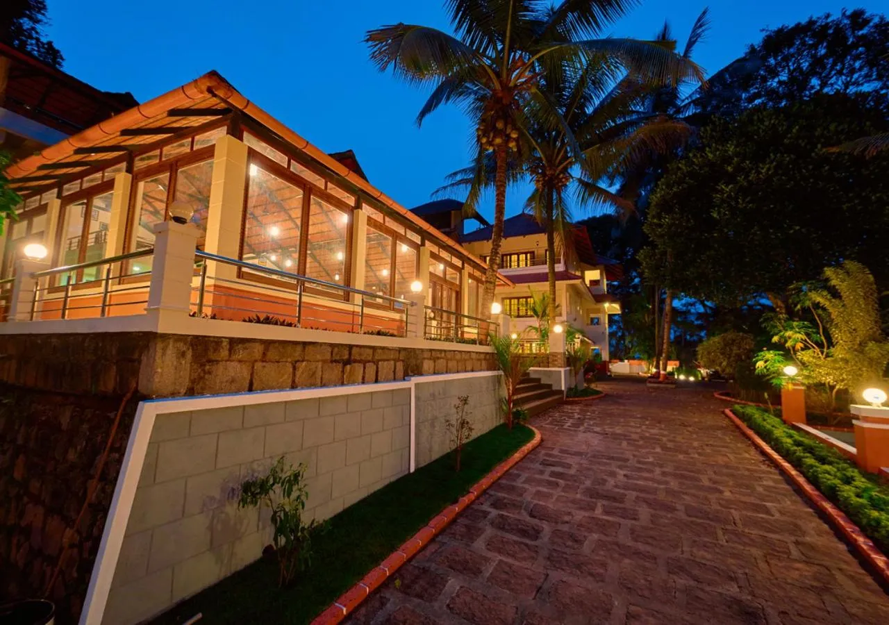 Property building in Ushasree Wayanad Premium Pool Resort by VOYE HOMES