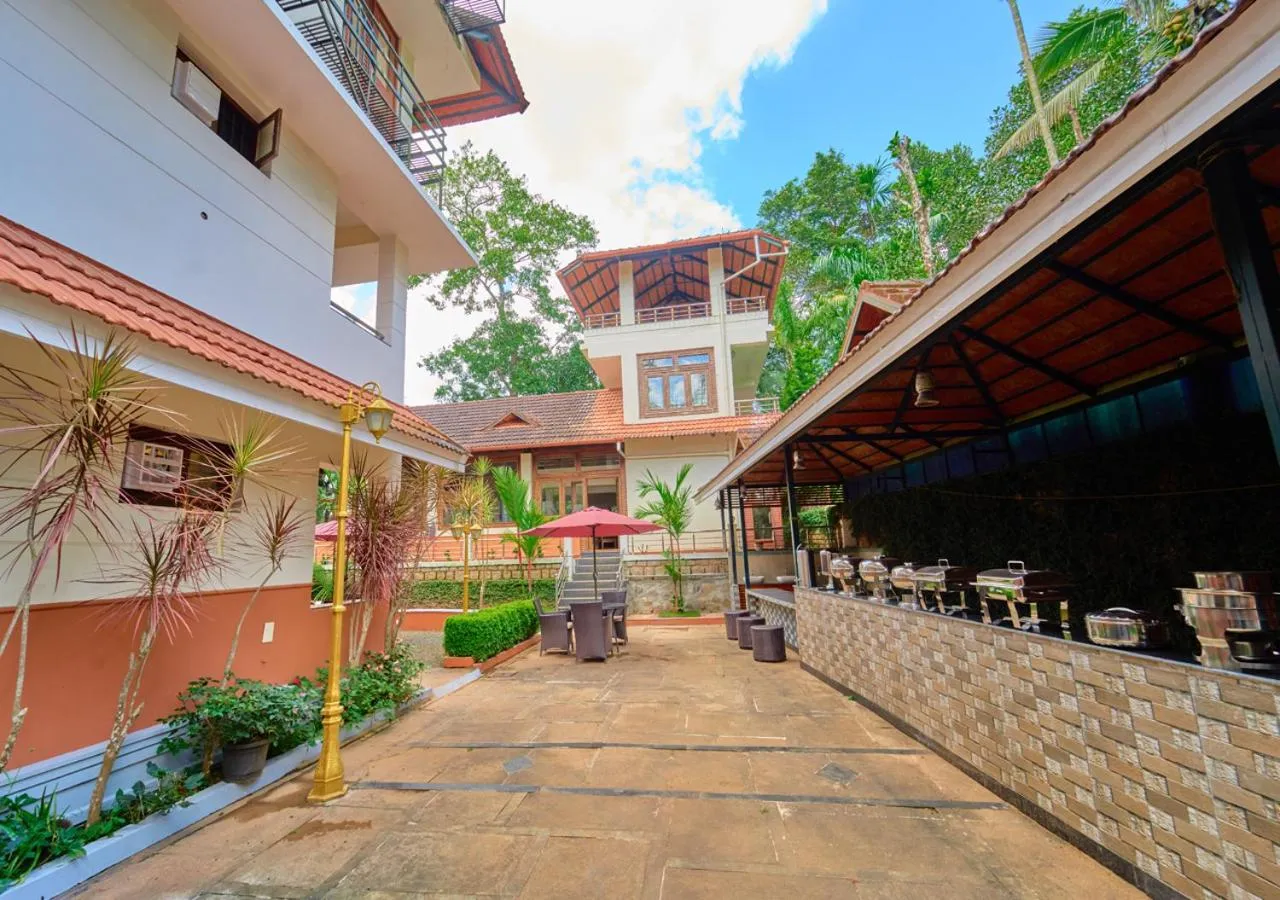 Property building in Ushasree Wayanad Premium Pool Resort by VOYE HOMES