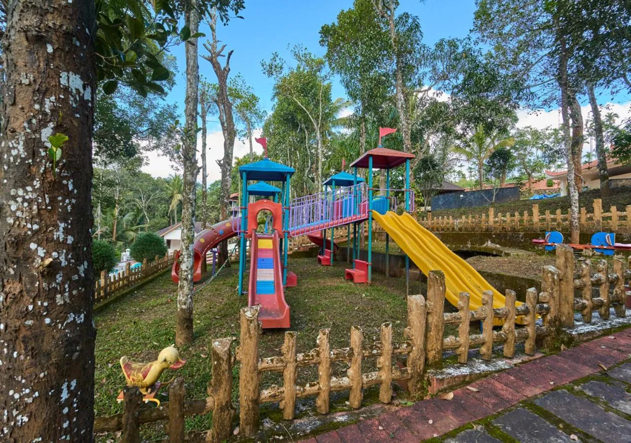 Children play ground in Ushasree Wayanad Premium Pool Resort by VOYE HOMES