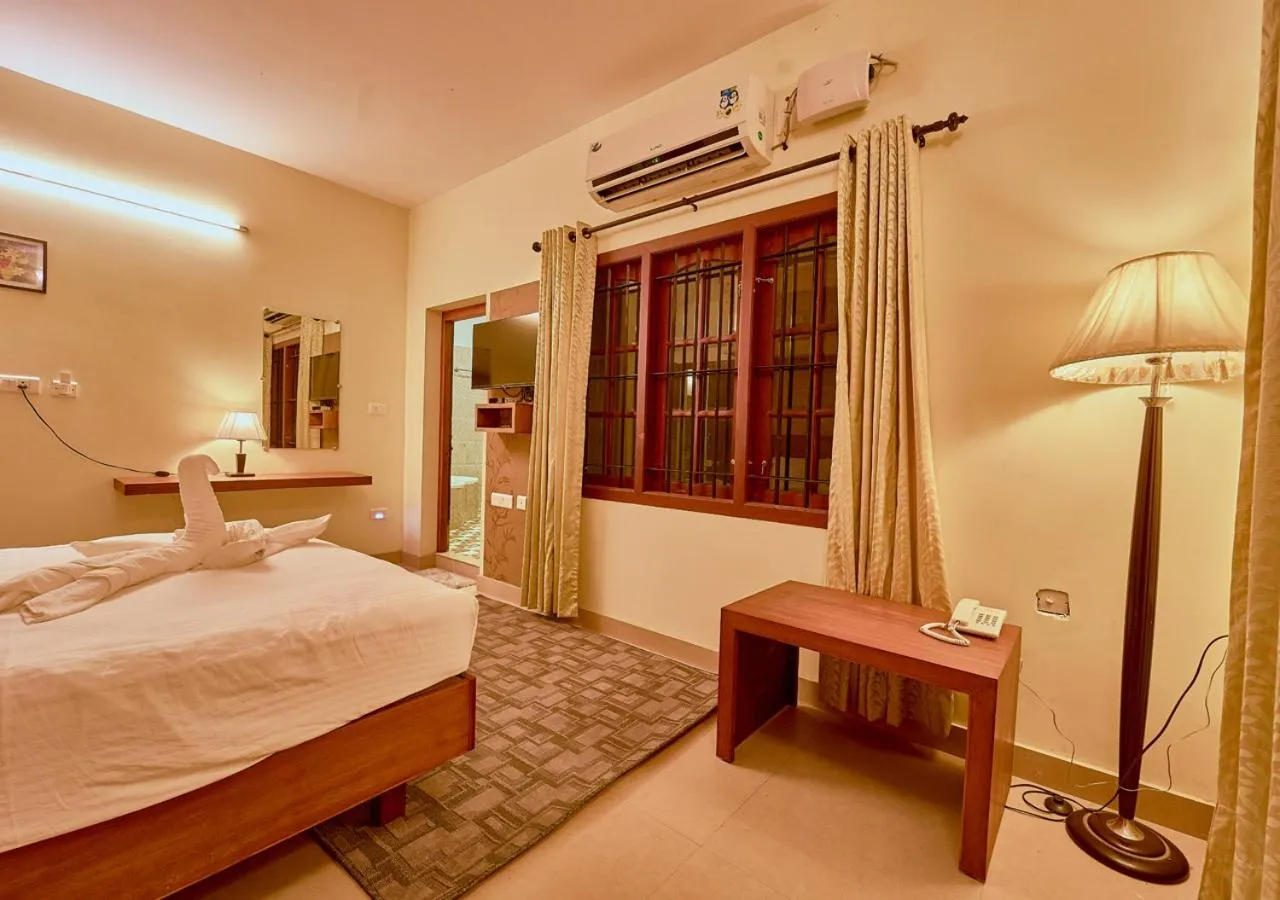 towels, Bed in Ushasree Wayanad Premium Pool Resort by VOYE HOMES