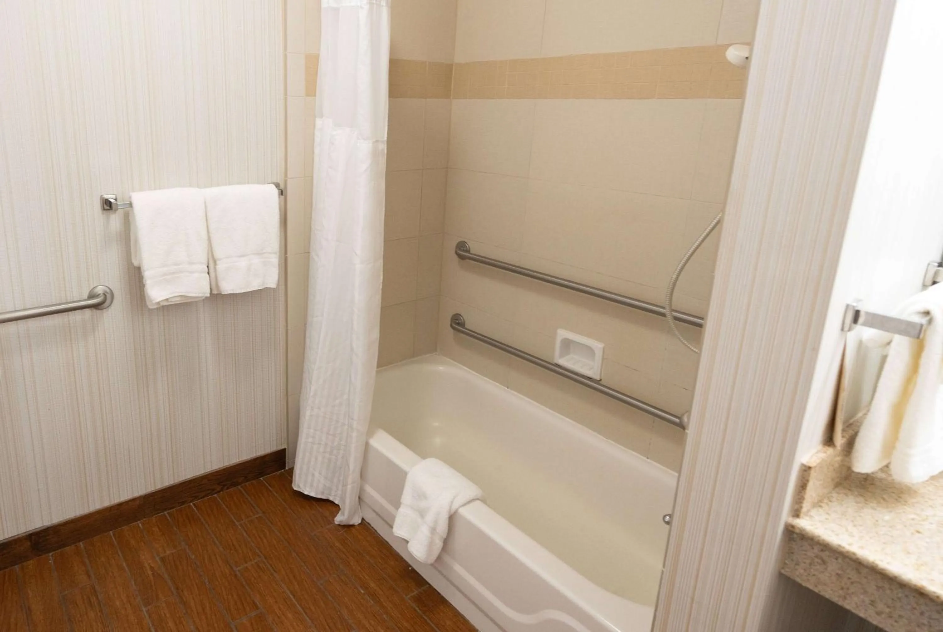 Bathroom in Wyndham Garden New Orleans Airport