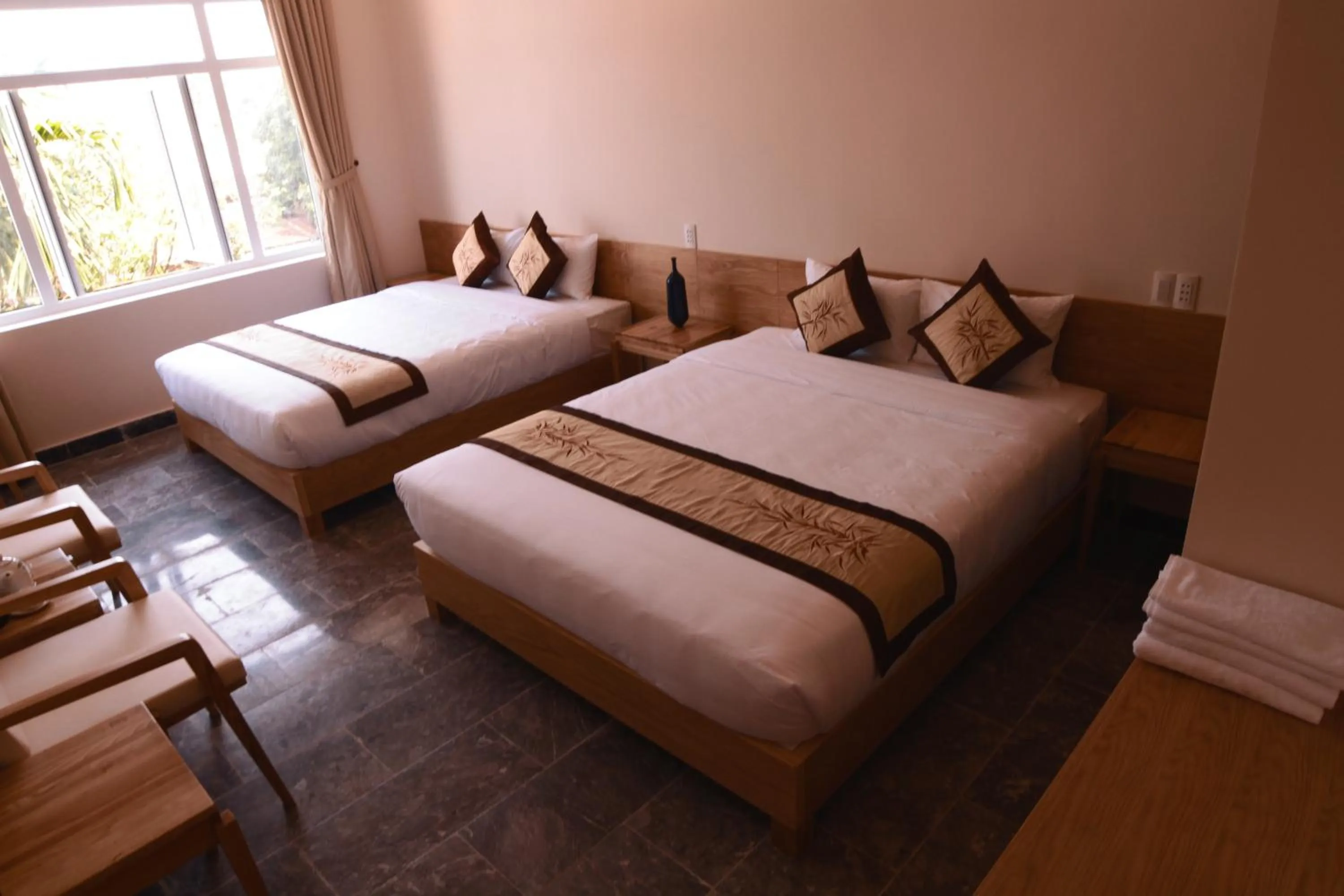 Bed in Jolie Villa Hoi An