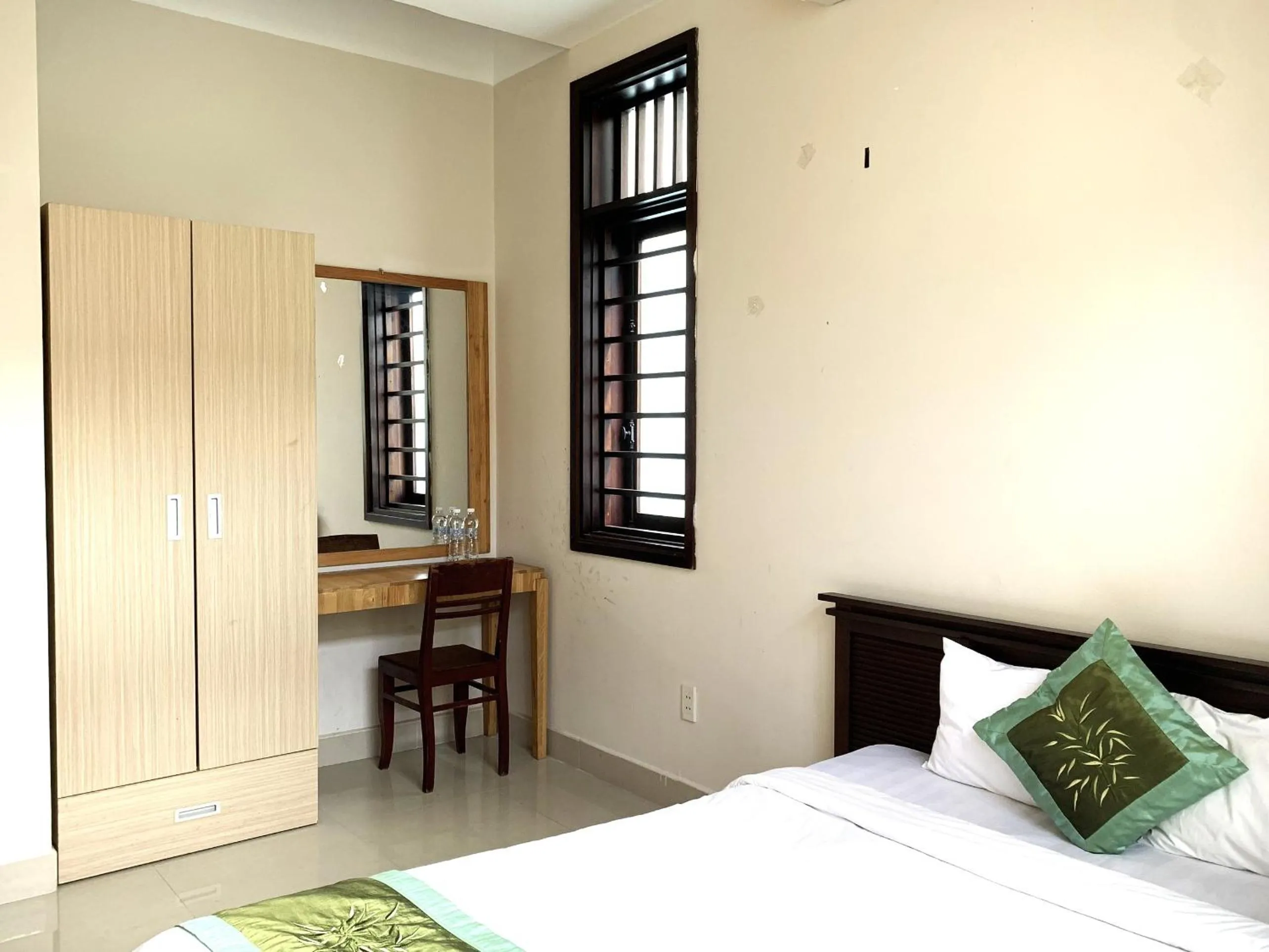 Bed in Jolie Villa Hoi An