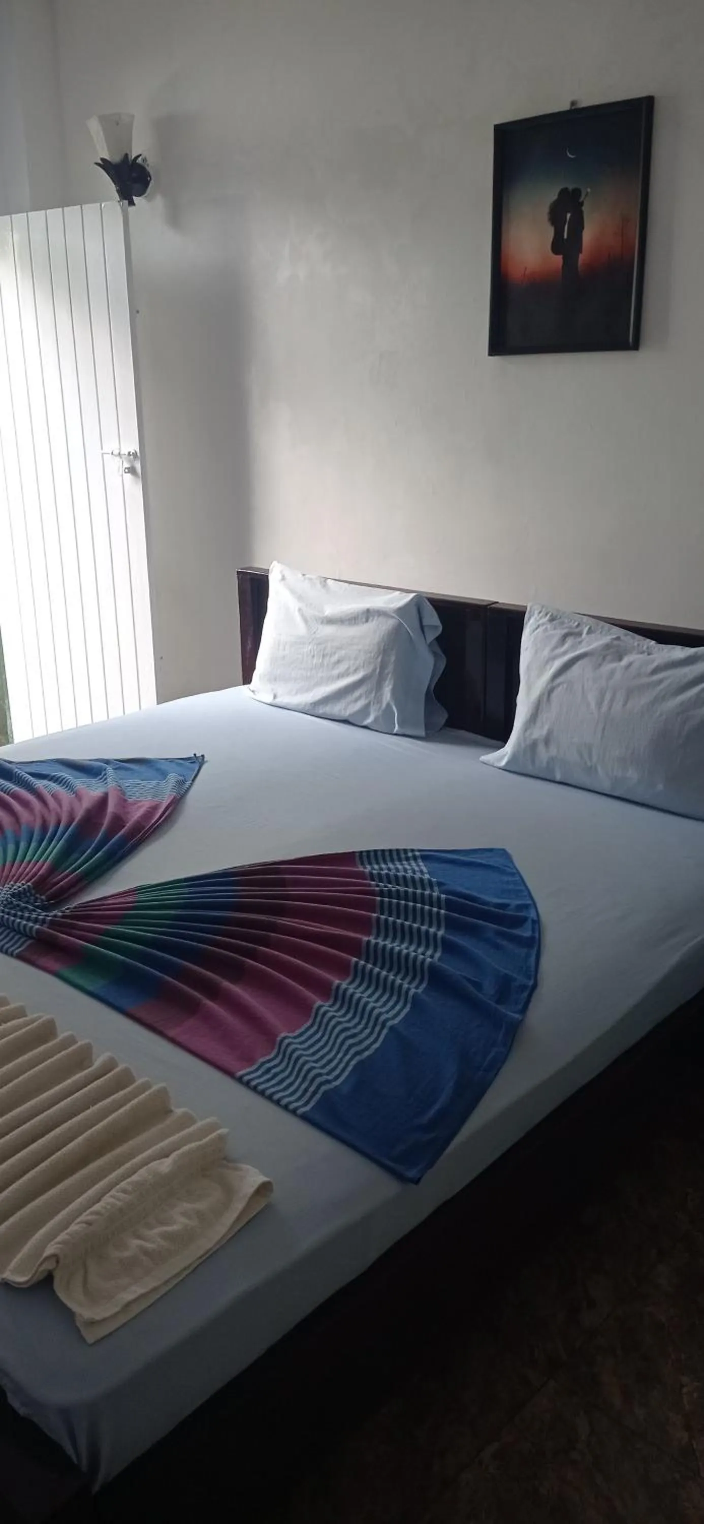 Bed in White Surfing Beach Resort