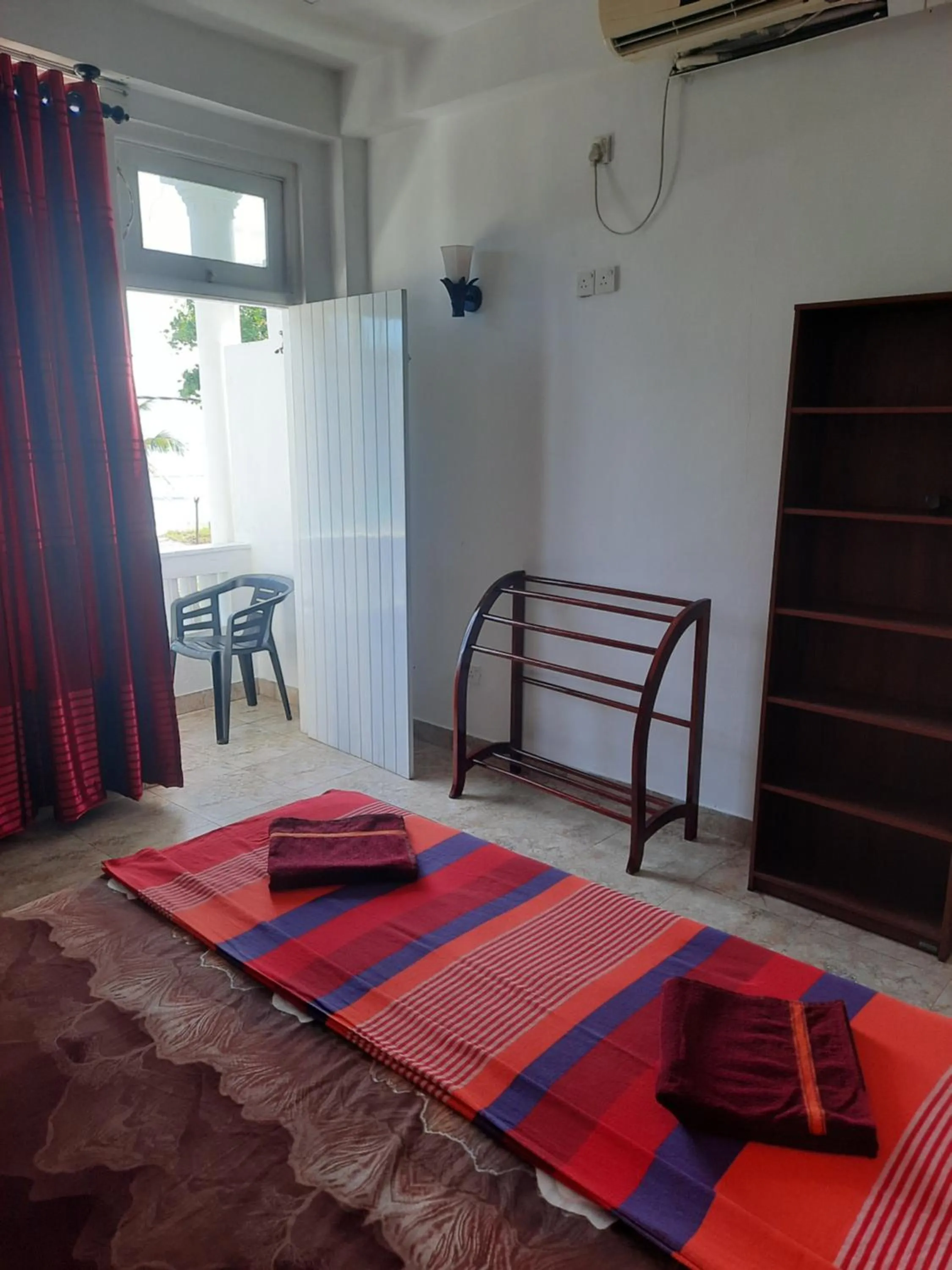 Bed in White Surfing Beach Resort