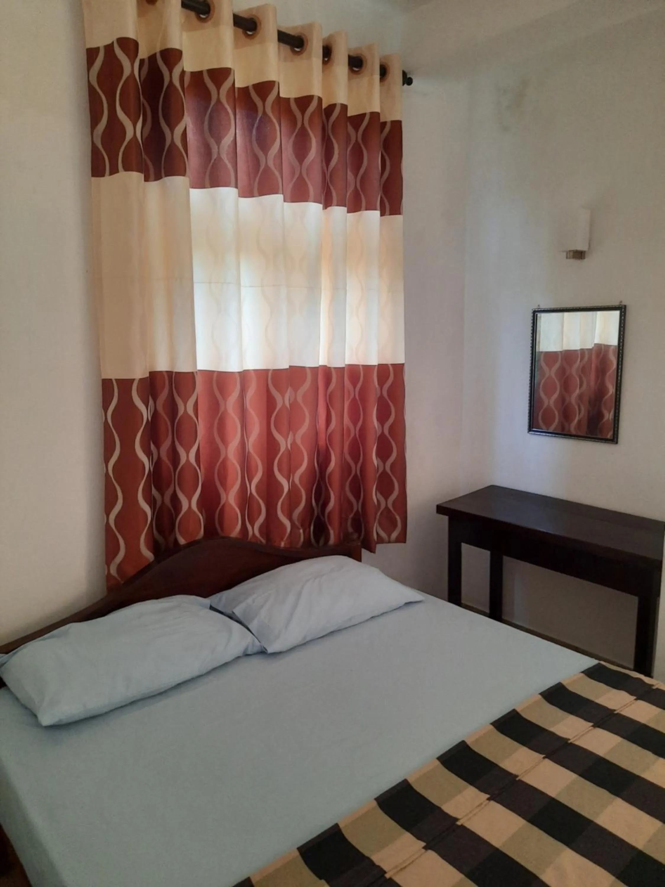 Bed in White Surfing Beach Resort