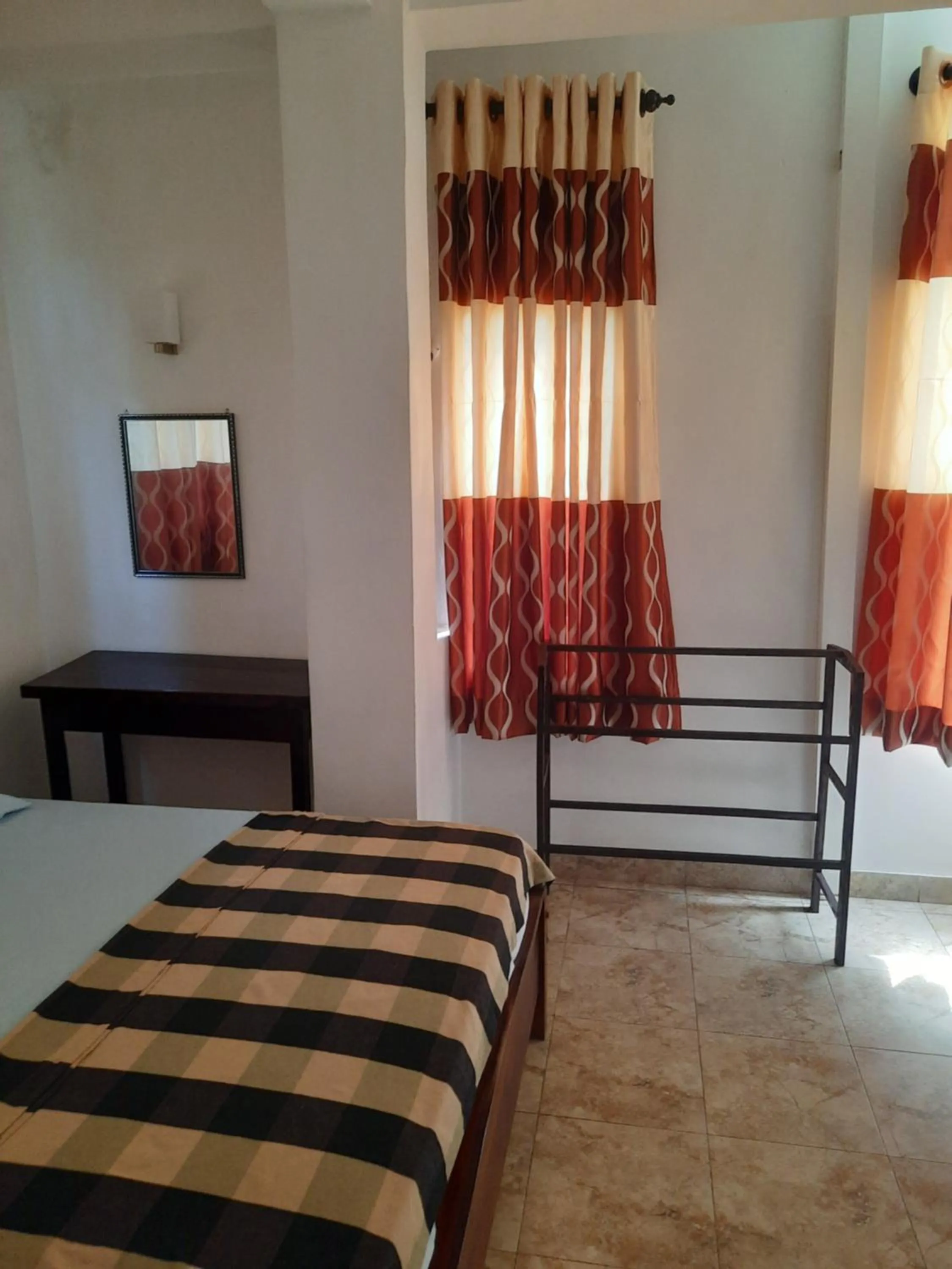 Bed in White Surfing Beach Resort