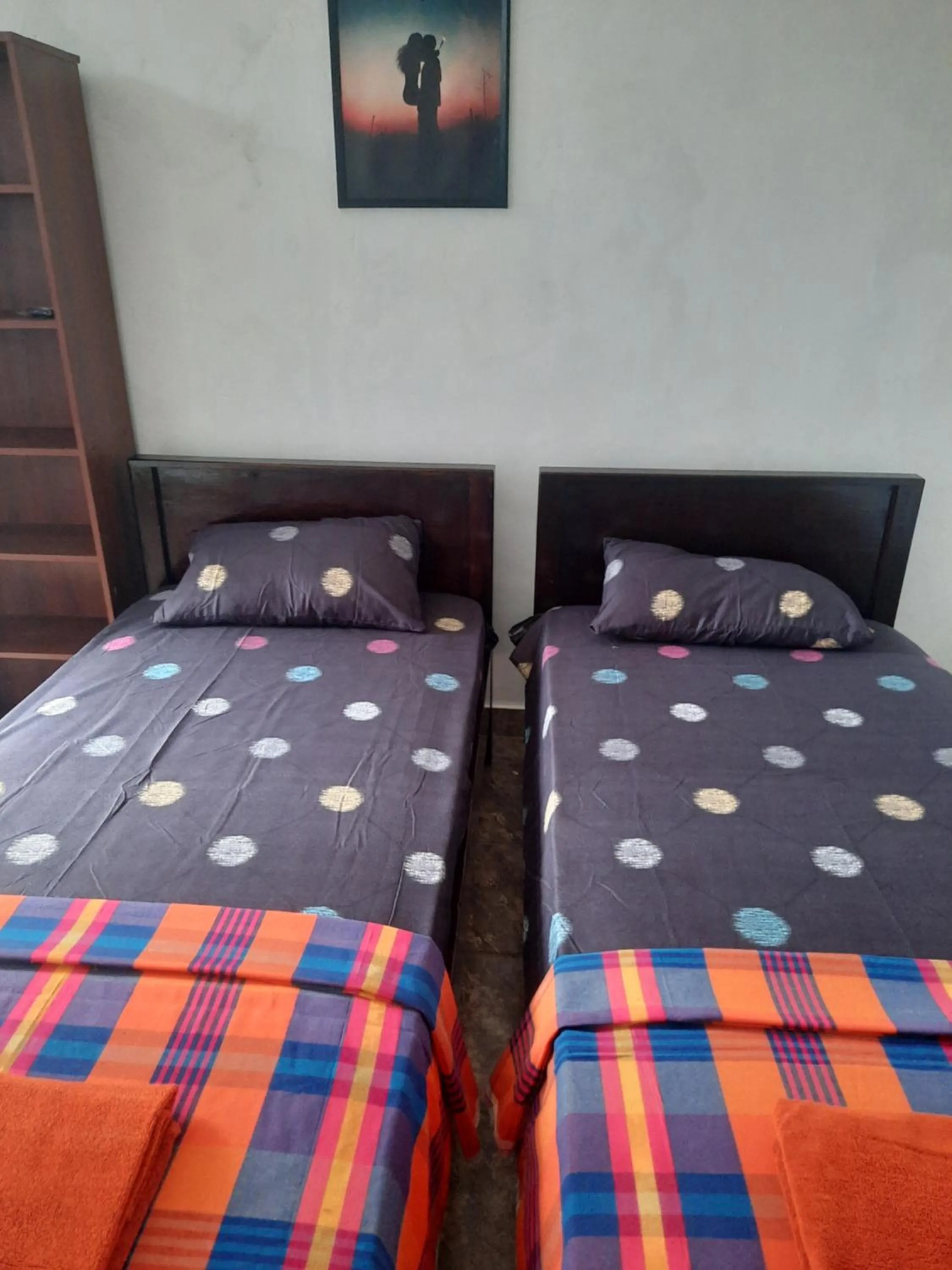 Bed in White Surfing Beach Resort