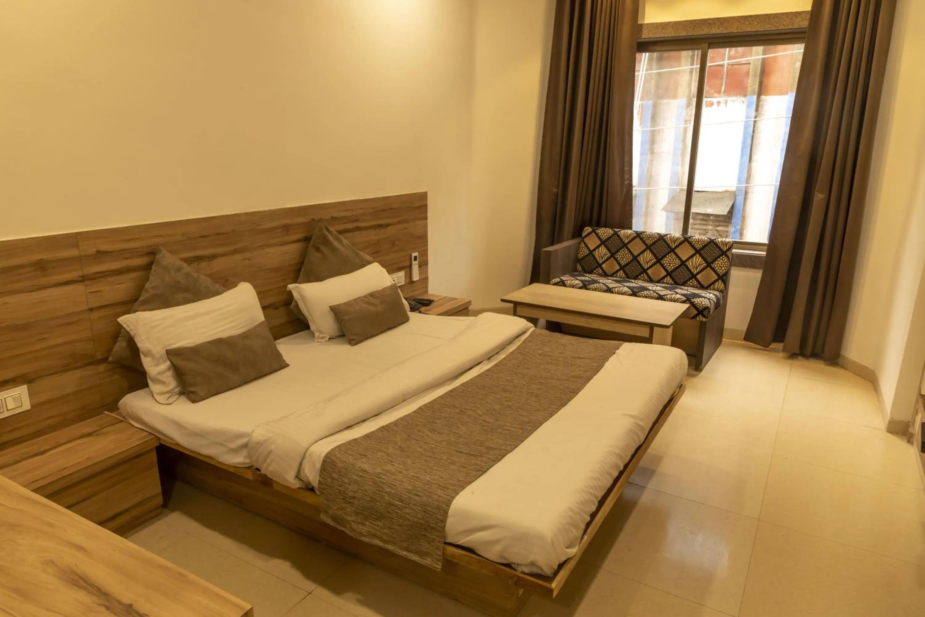Bed in Adarsh Palace Hotel Near Bhopal Railway Station and Nadra Bus Stand Bhopal