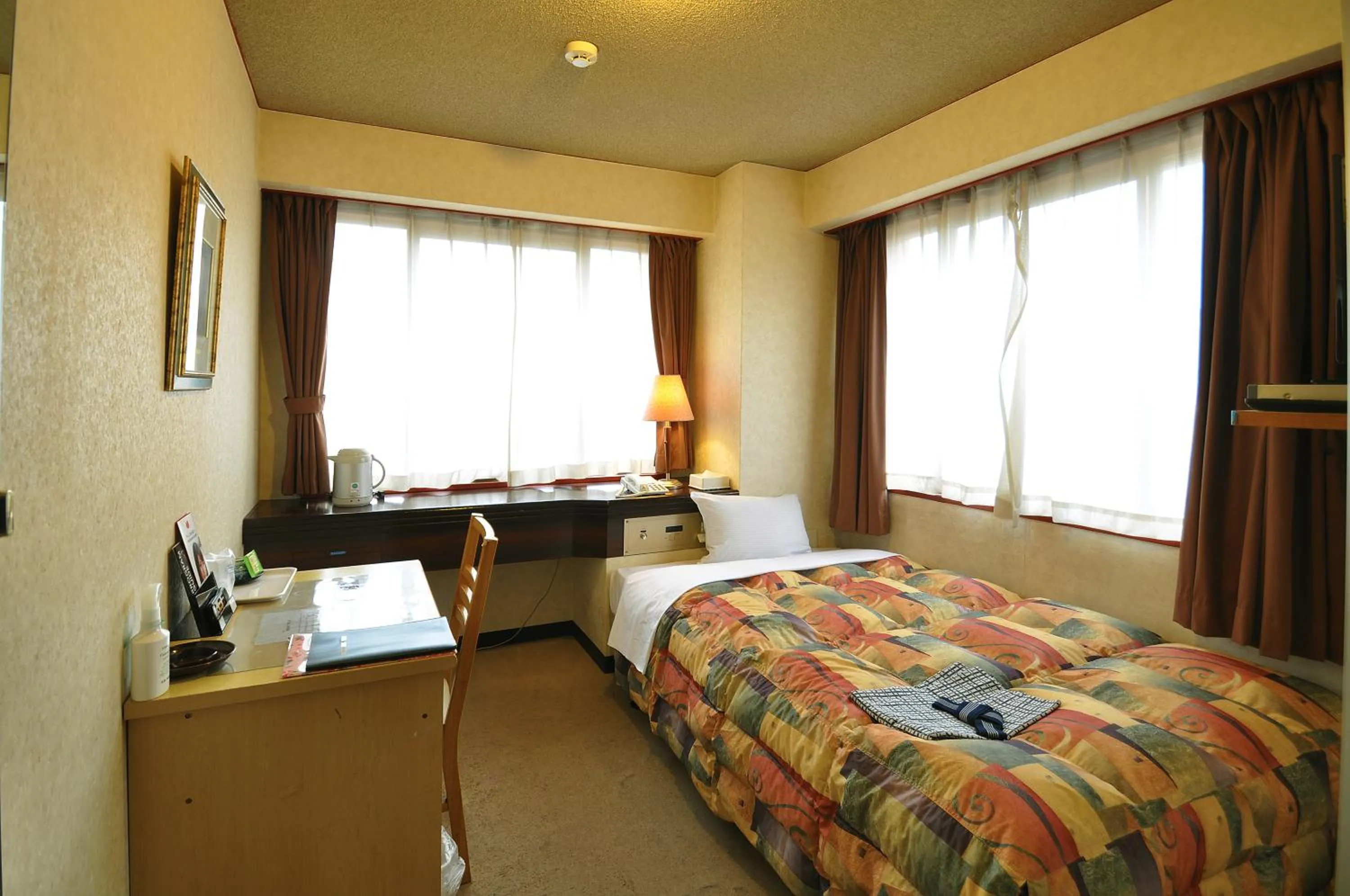 Photo of the whole room, Bed in Business Hotel Atelier