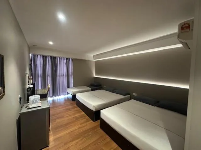 Bed in Li Garden Hotel