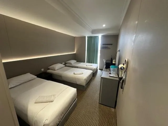 Bed in Li Garden Hotel