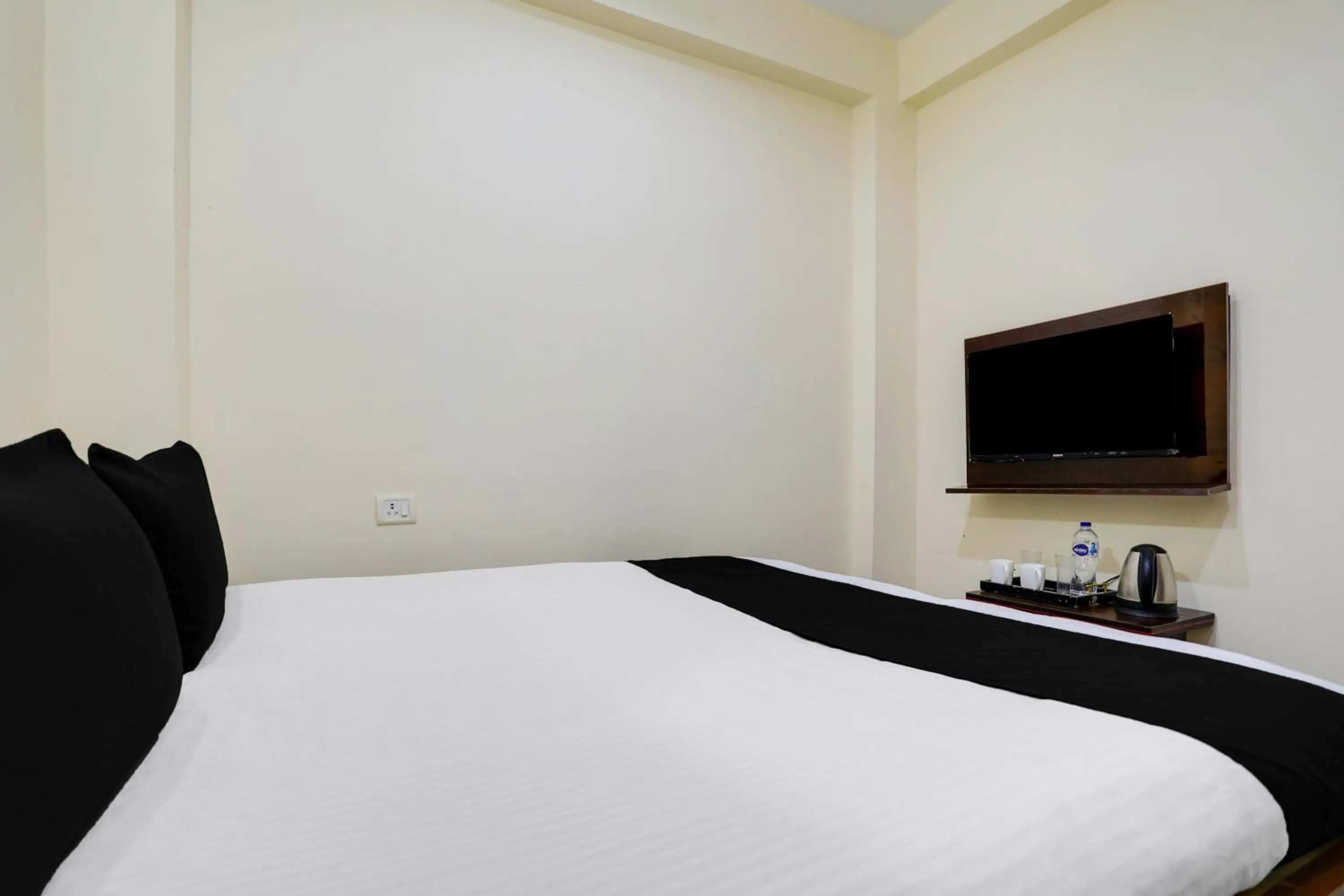 Bedroom in Hotel O M.V PALACE